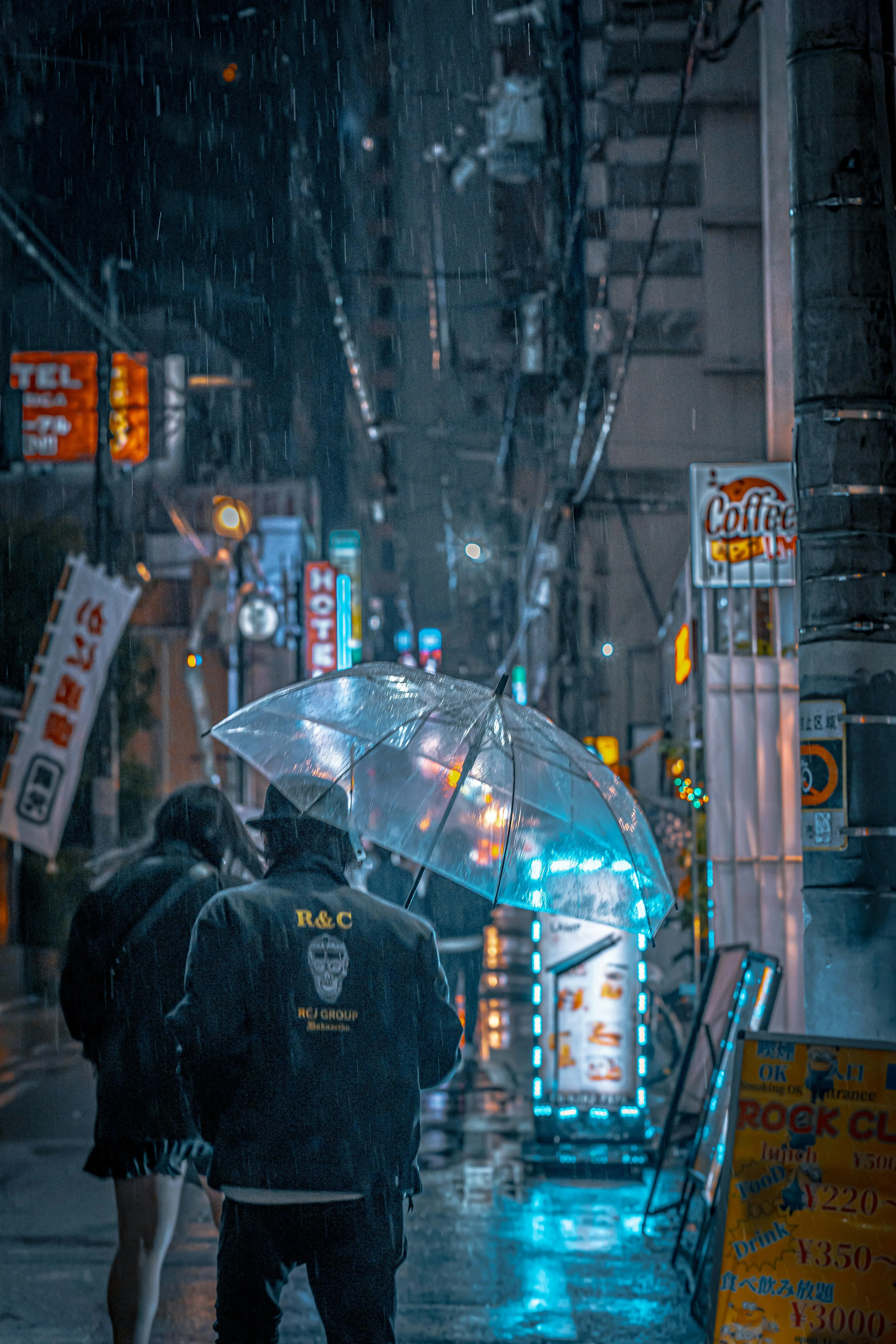 Crowd with Umbrellas in a Busy Urban Street Scene Wallpaper