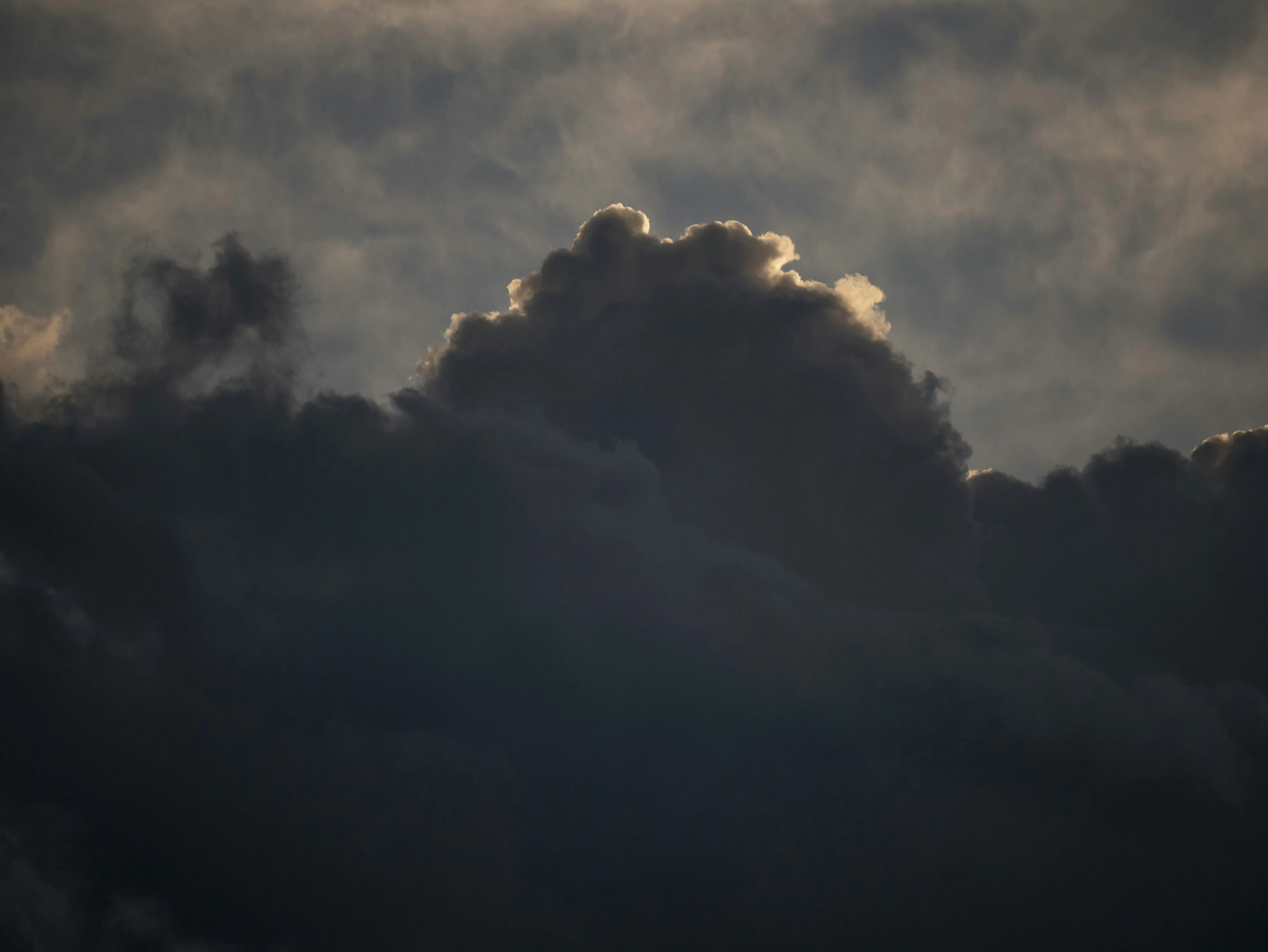 Dark Clouds Blocking Sunlight Creating Moody Atmosphere