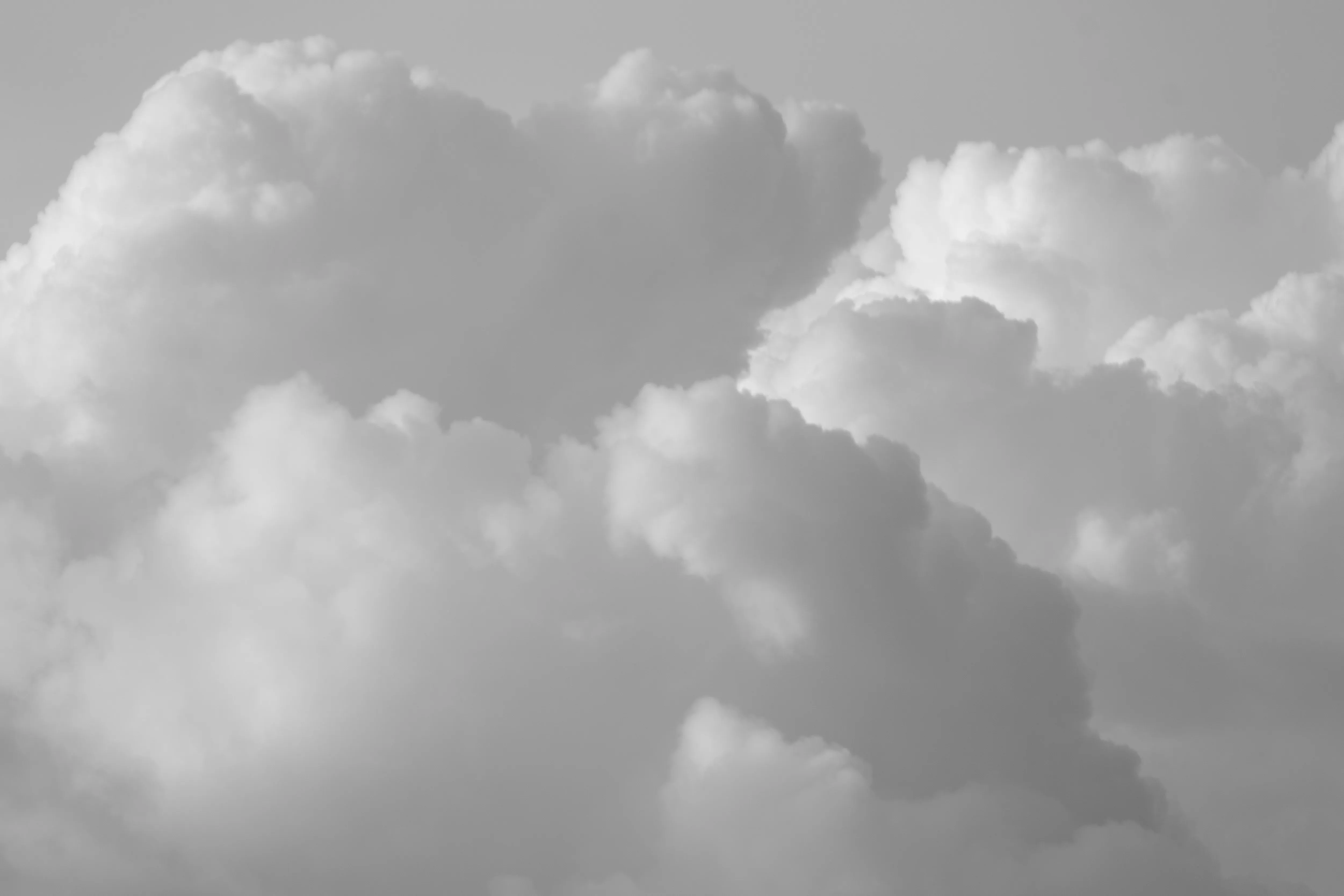 Dark Clouds Gathering in Sky Above Peaceful Mountain