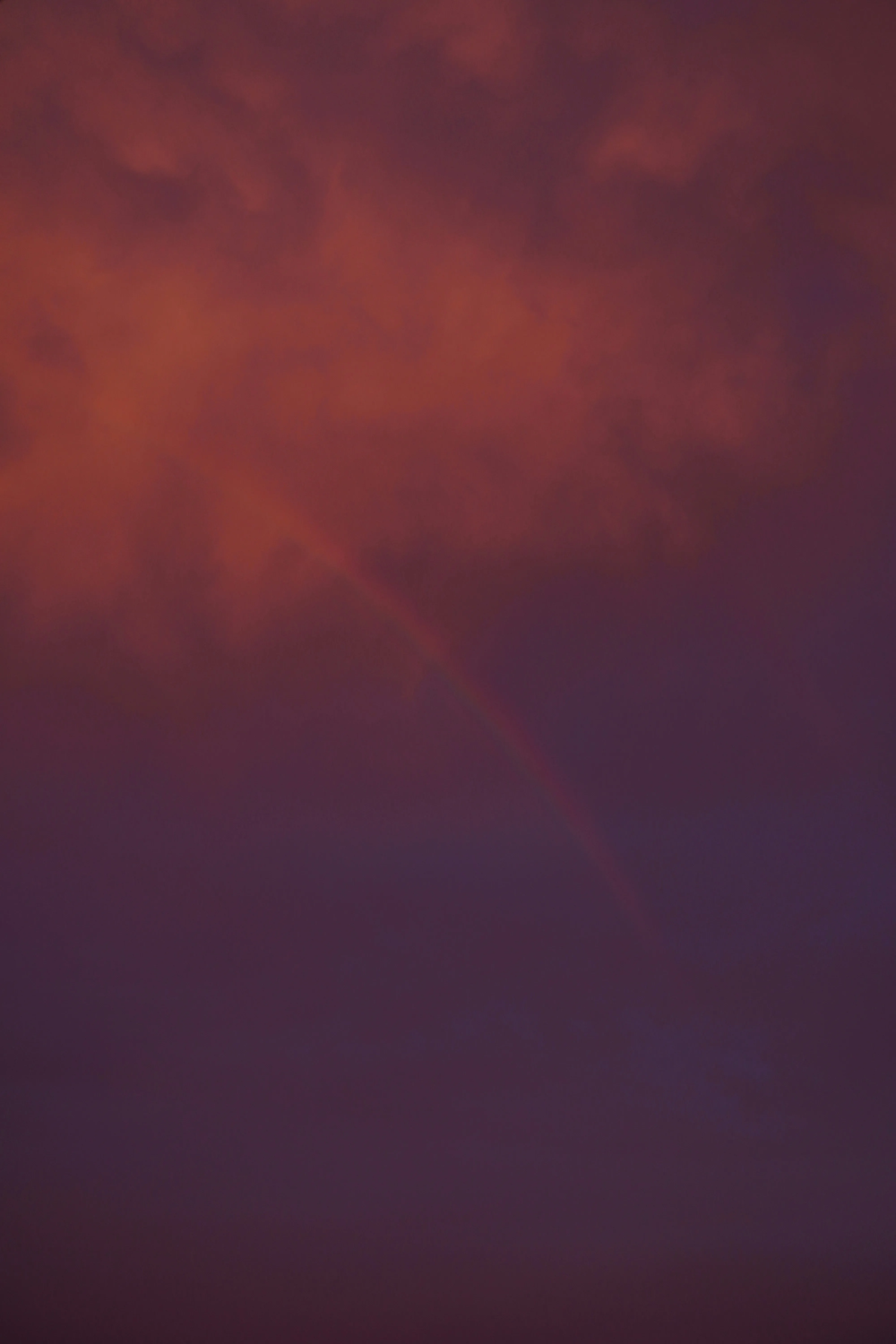 Dark Red Storm Clouds Creating Dramatic Moody Sky Wallpaper