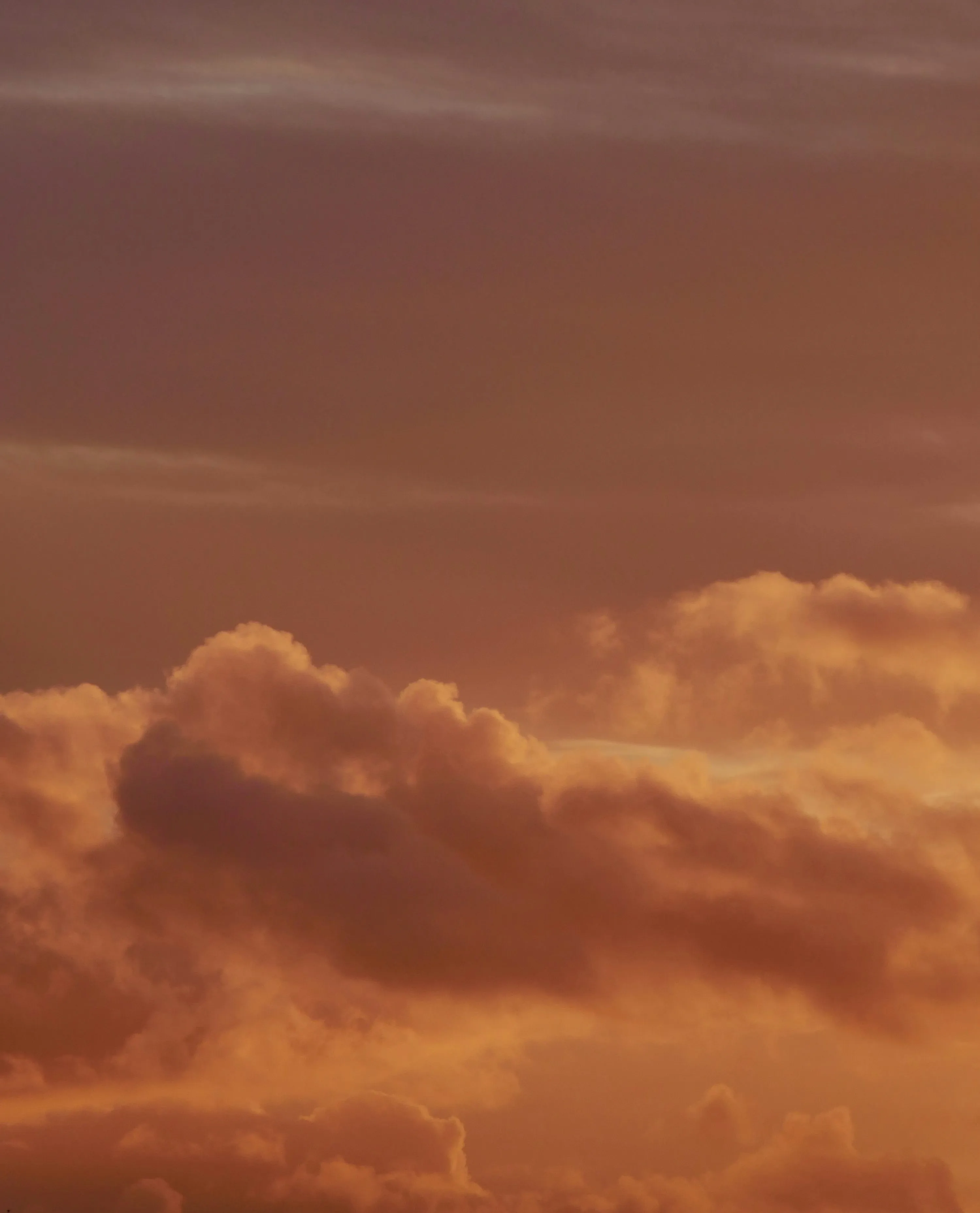 Deep Orange Clouds Reflecting Warm Sunset Colors Wallpaper