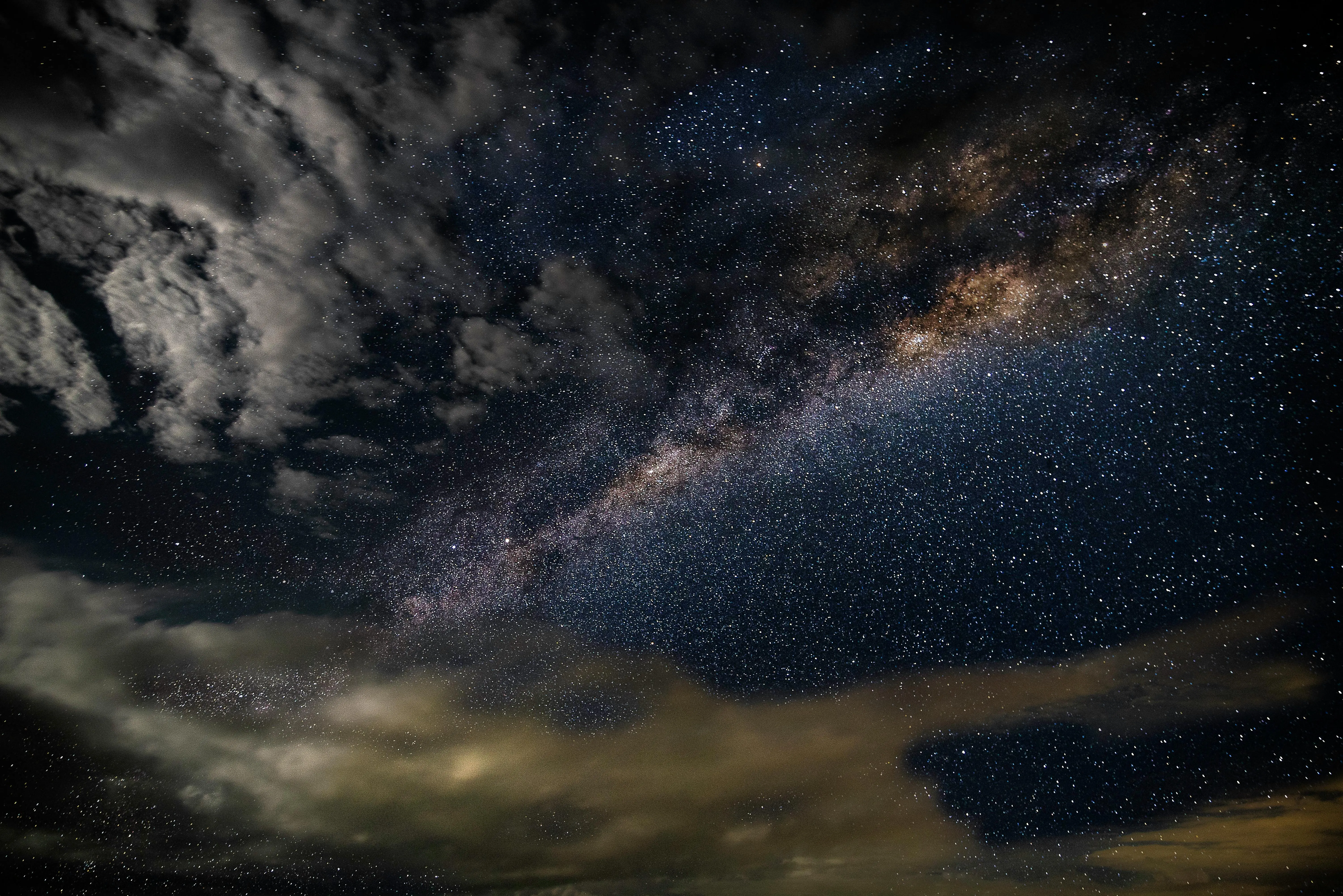 Dense Stars and Galactic Swirl in Night Sky View Wallpaper