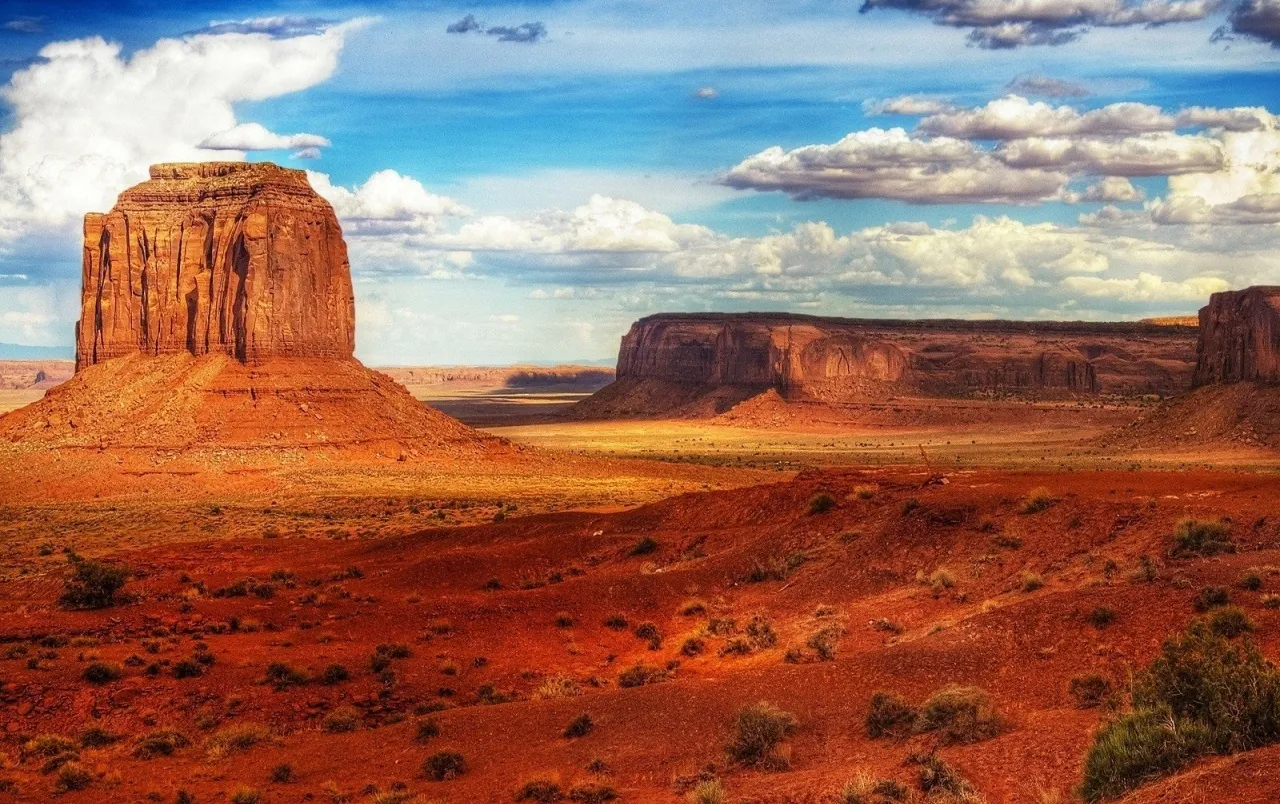 Desert Landscape with Large Rock Formation and Sky Image