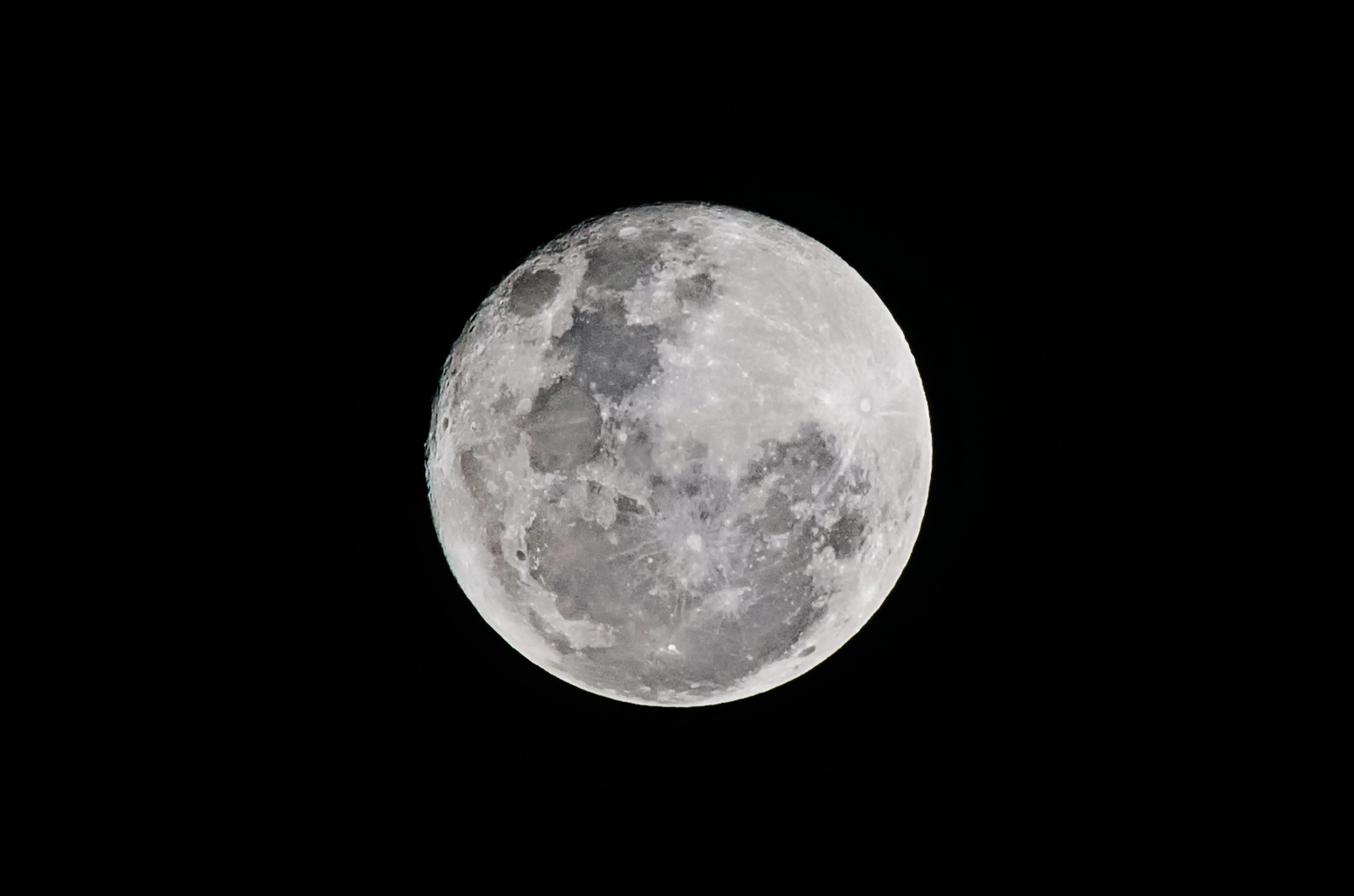 Detailed Full Moon Against a Pitch Black Night Sky Image