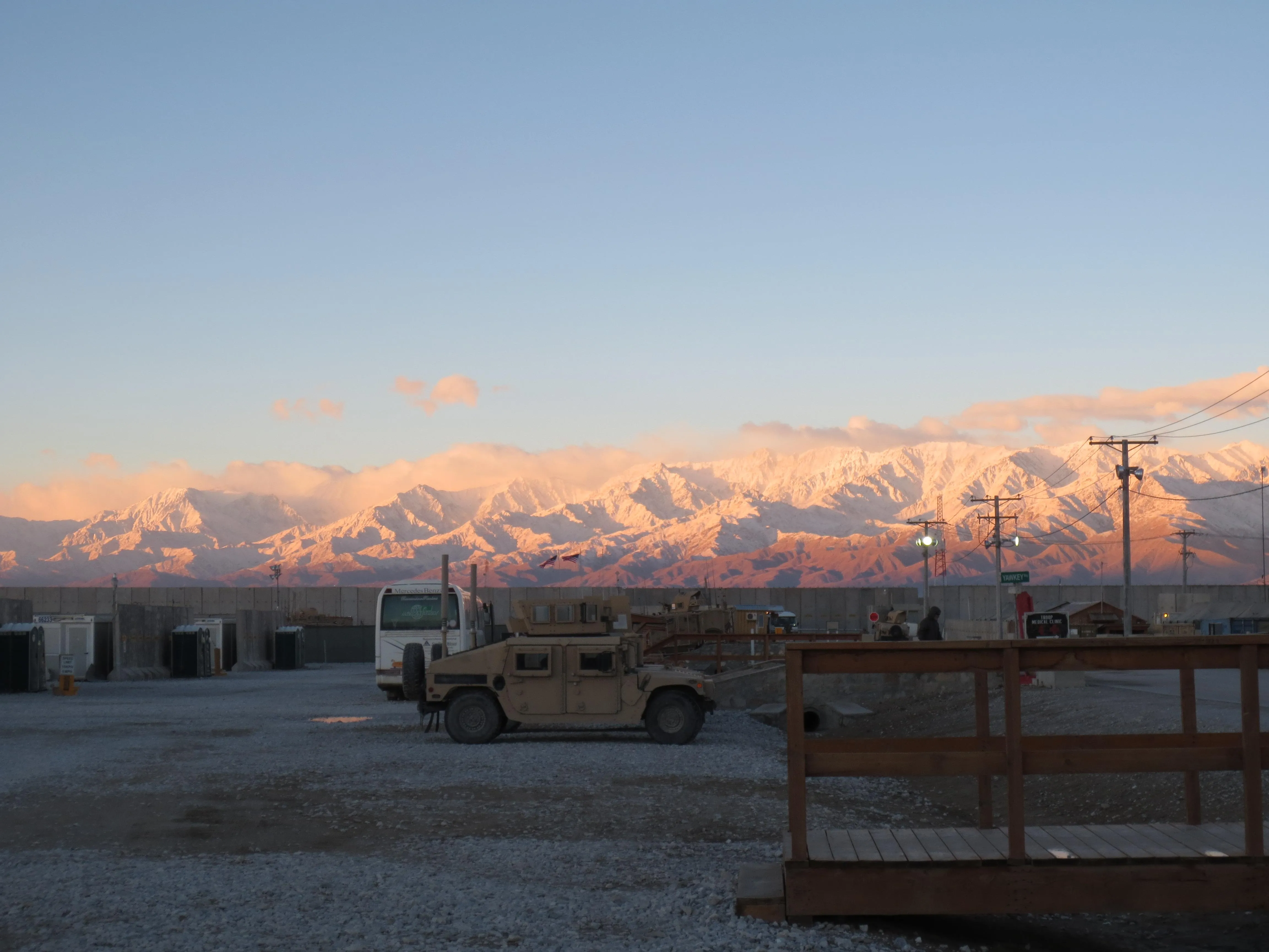 Docks at sunset with vivid red orange sky free Wallpaper