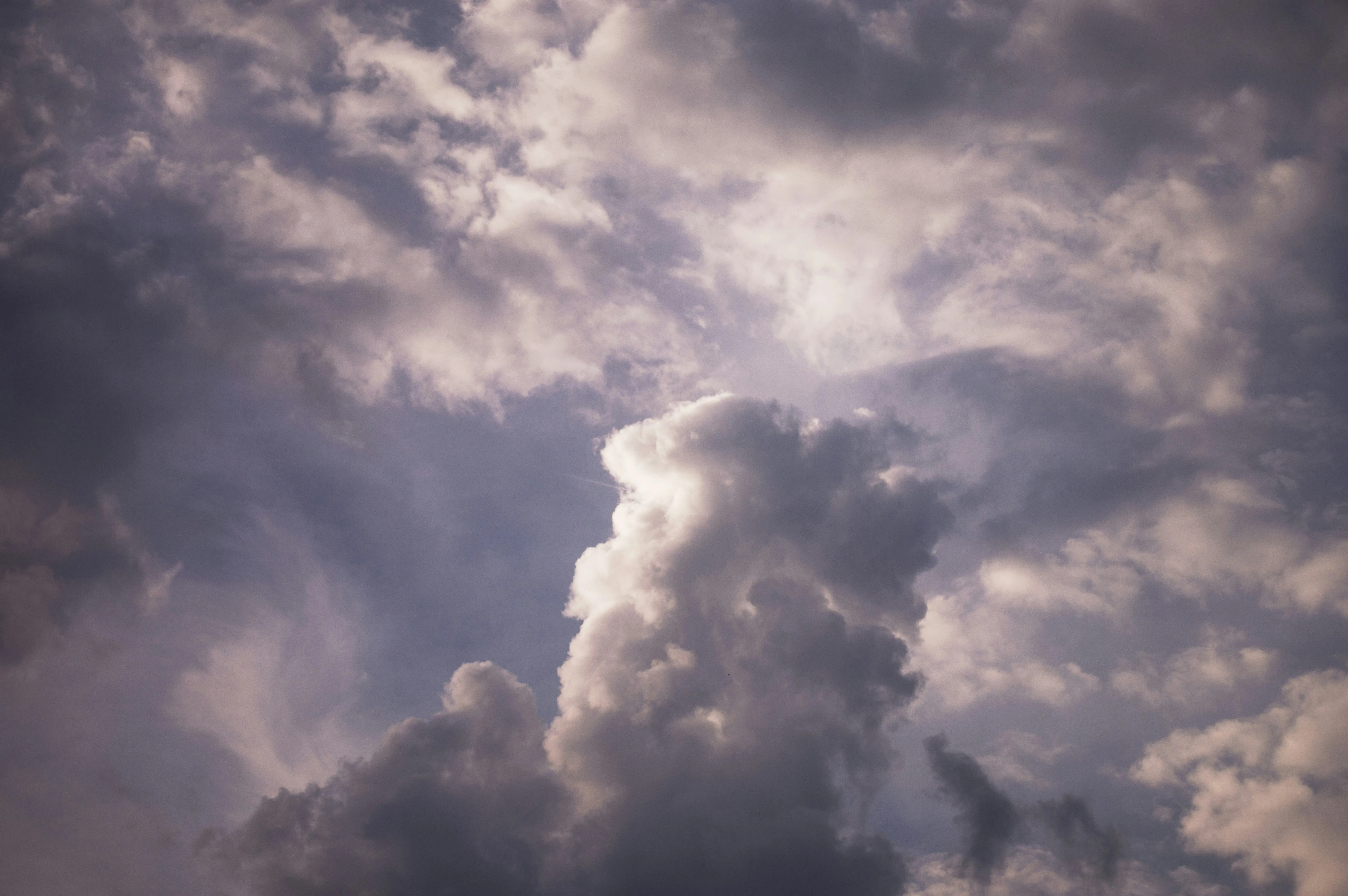 Dramatic Cloud Formation with Purple and Pink Colors in Sky