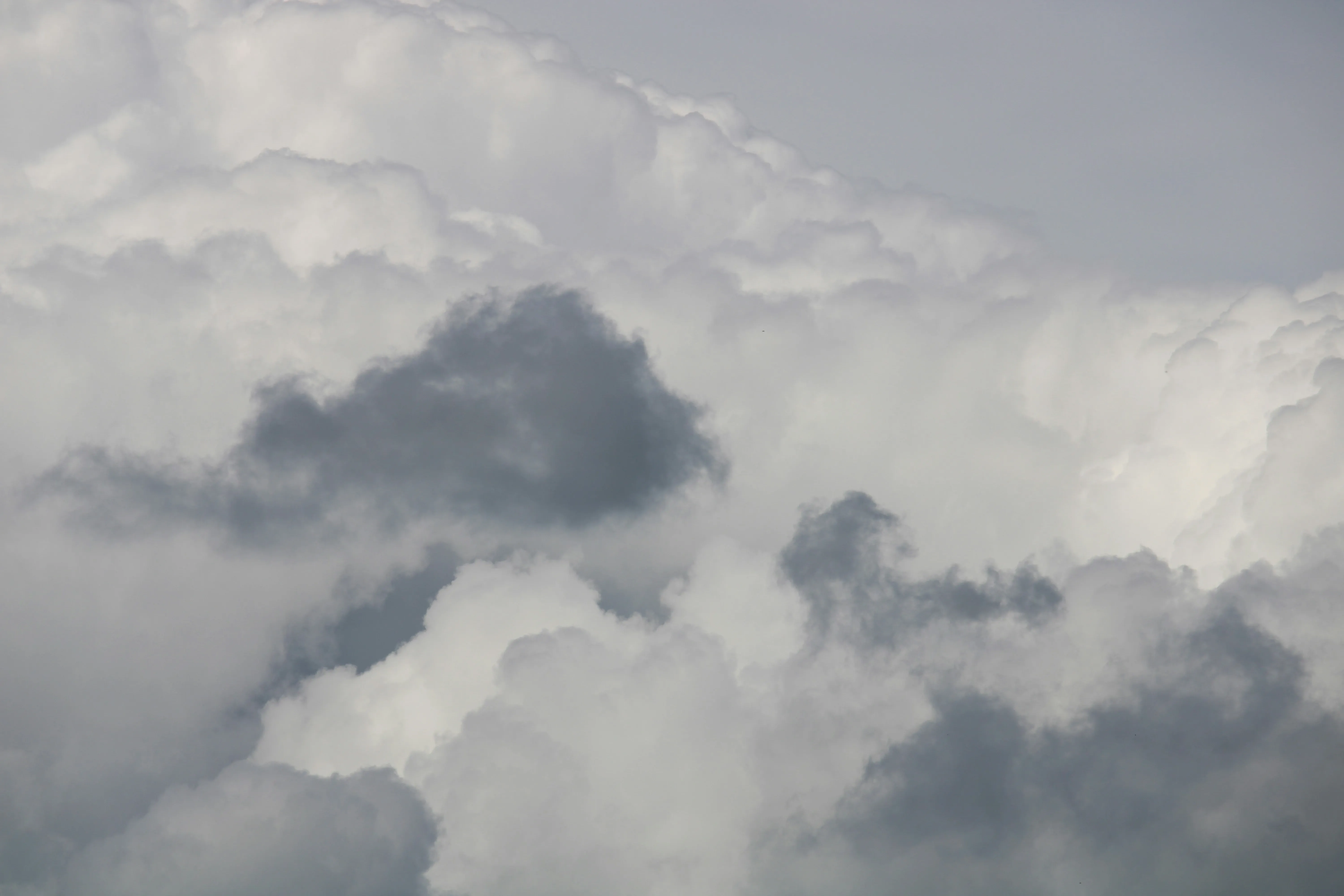 Dramatic Cloud Formations Against Gray Background Free HD
