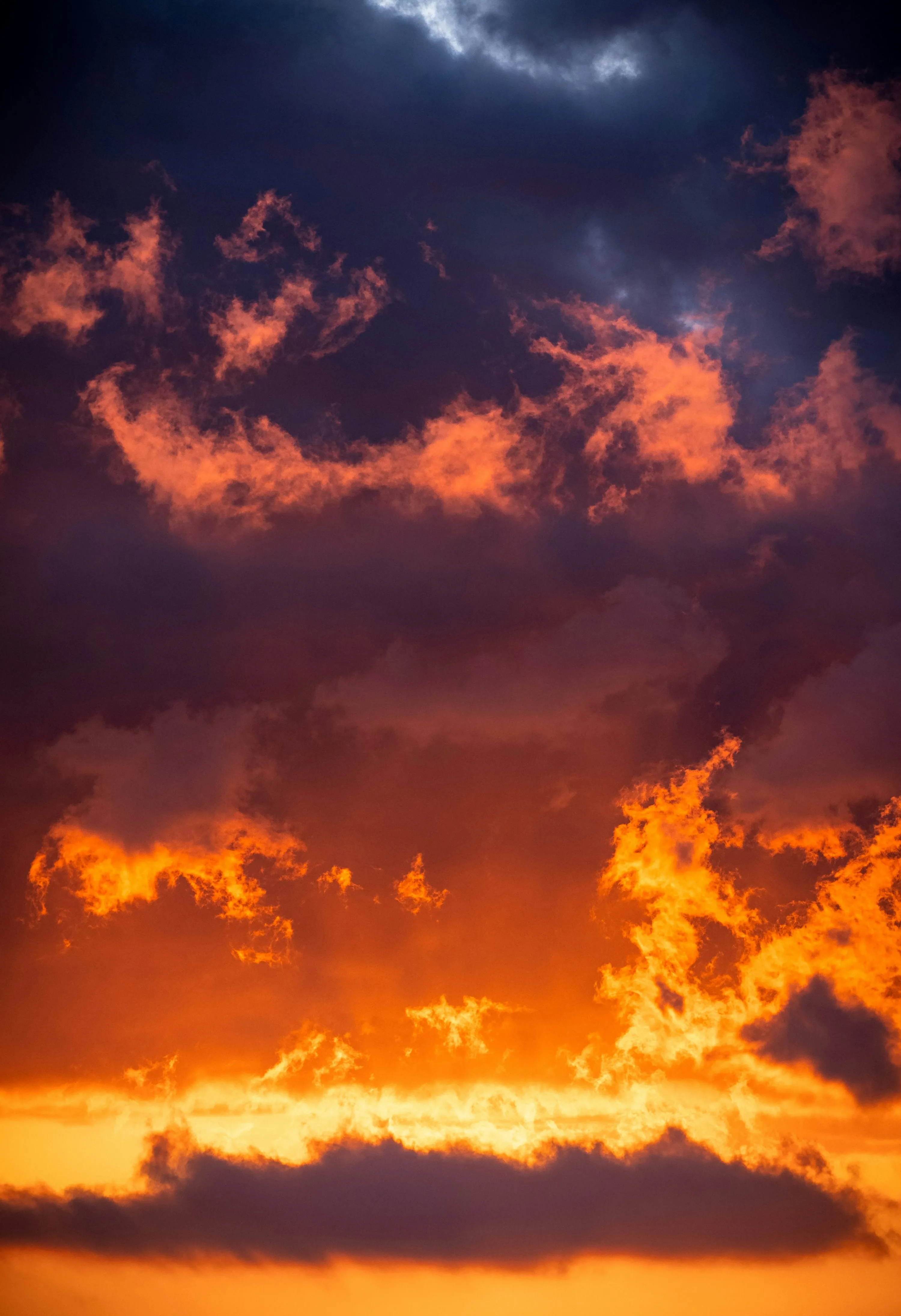 Dramatic Fiery Sunset Sky with Vibrant Orange Clouds