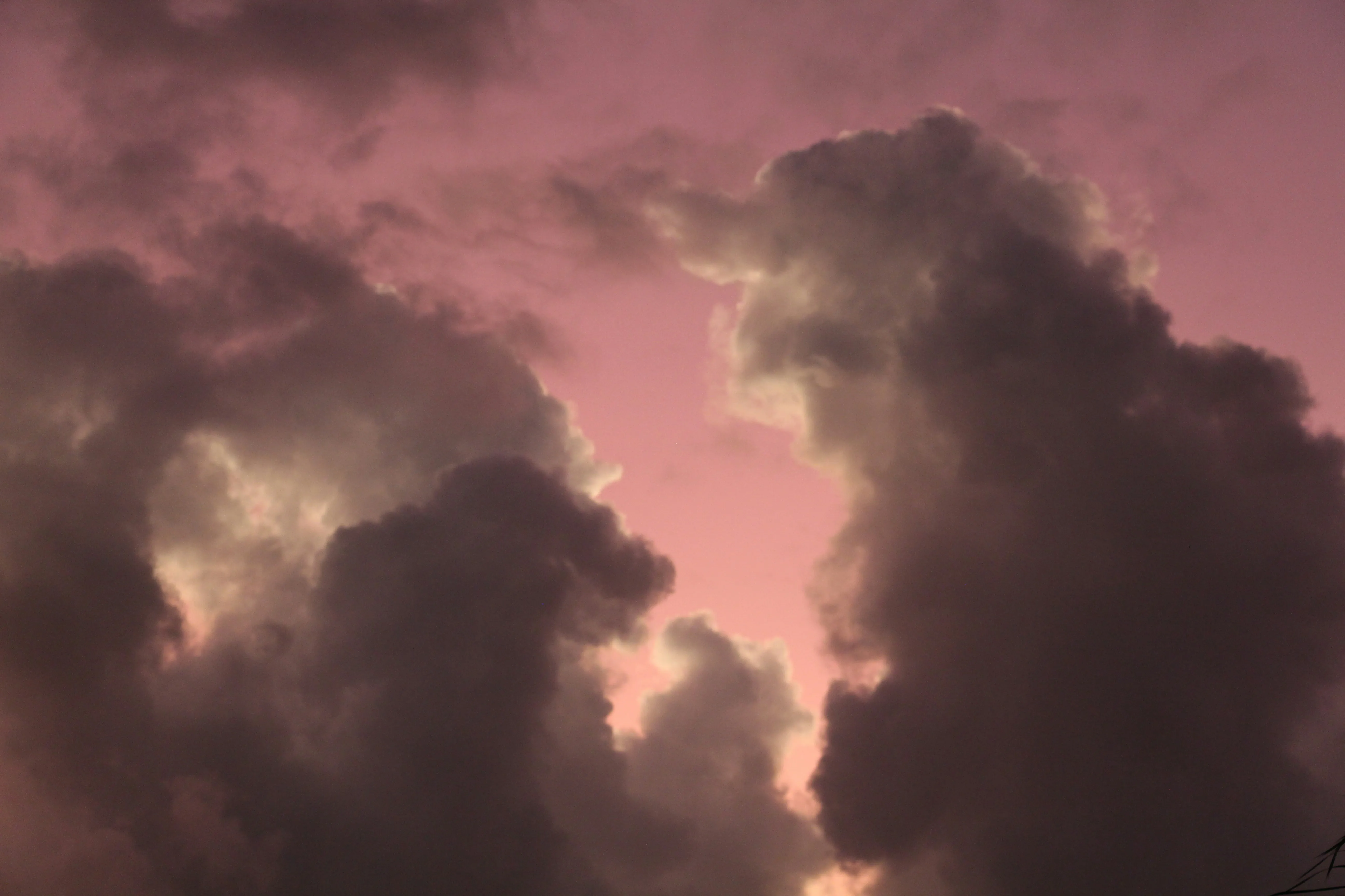 Dramatic Pink and Purple Cloudscape at Dusk in the Sky