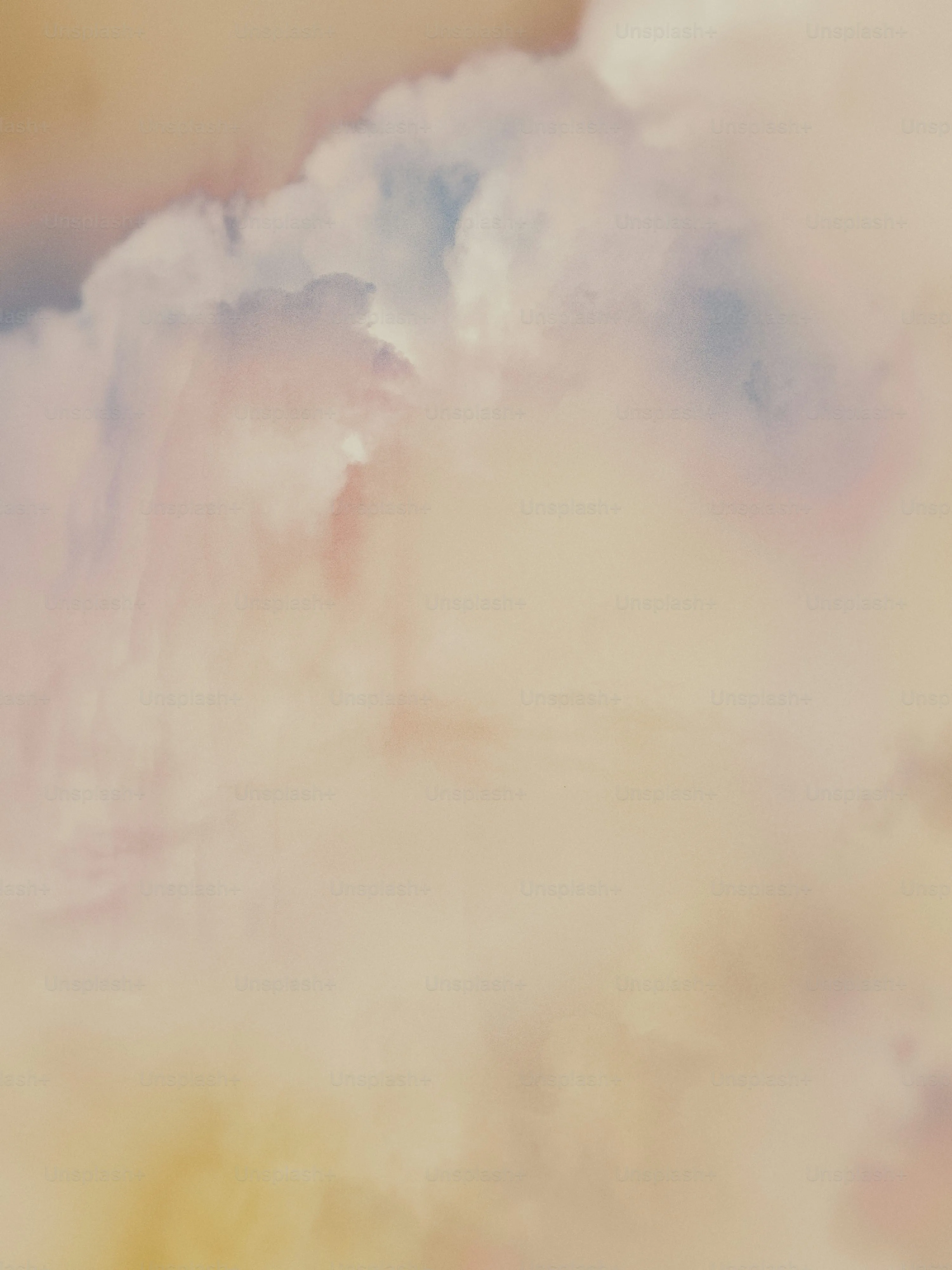 Dreamy Pastel Colored Clouds in a Soft Evening Sky Image