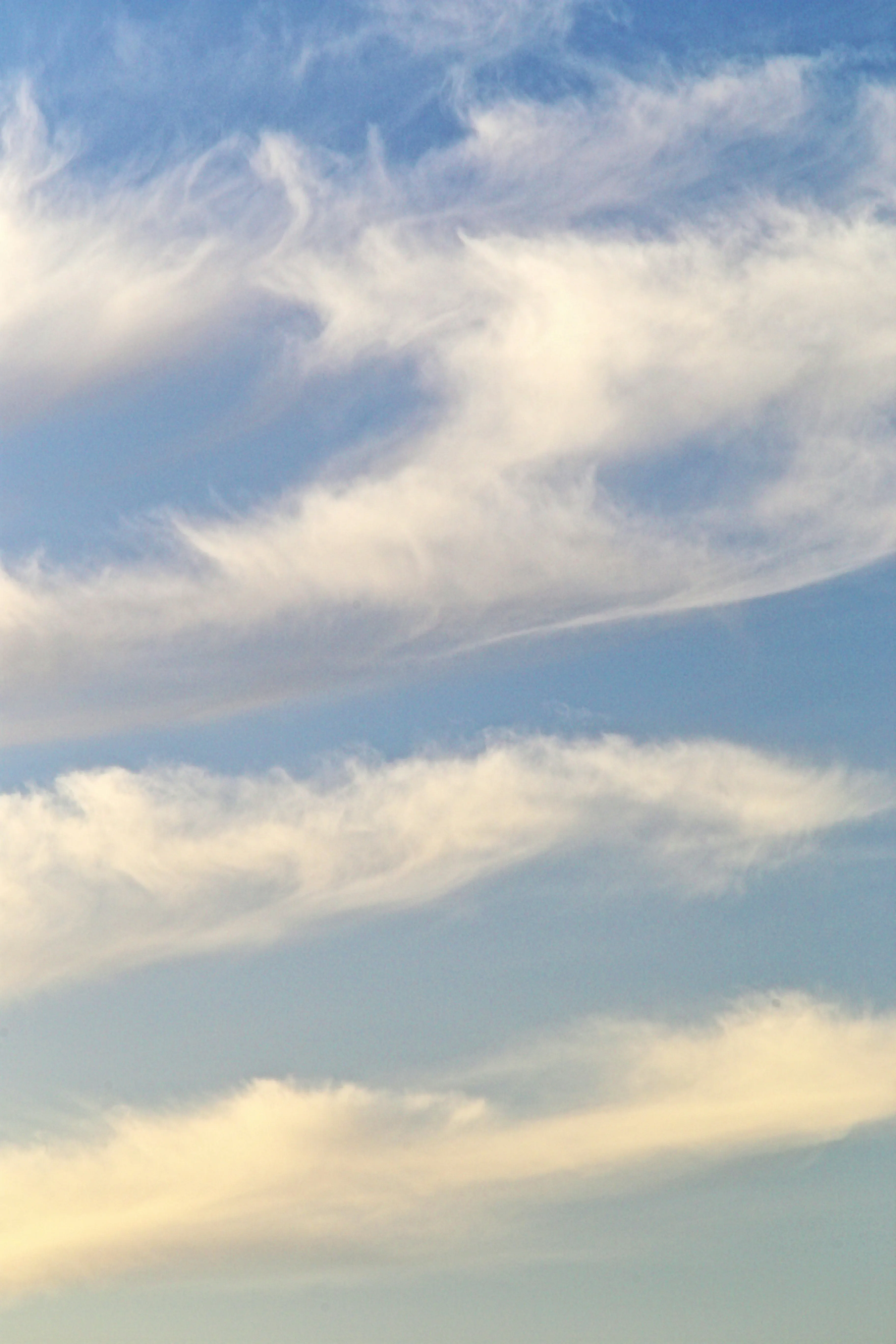 Early Morning Sky with Soft Orange Light and Clouds