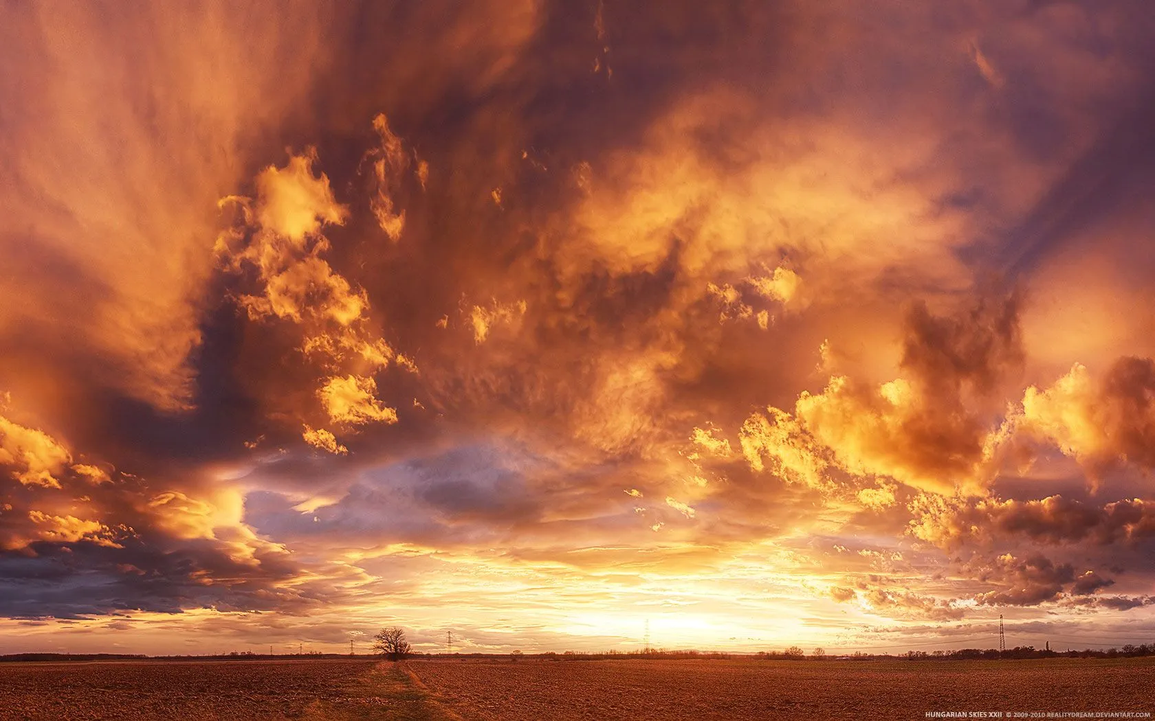 Fiery Orange and Red Sky During Dramatic Sunset Wallpaper