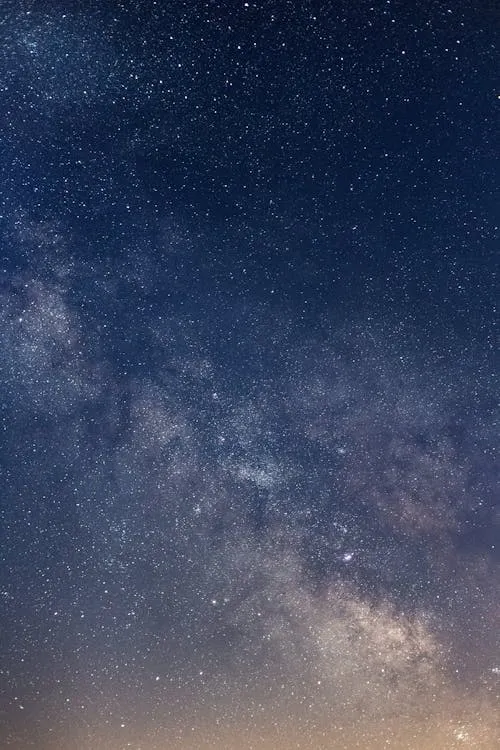 Galaxy View at Night with Stars and Subtle Cloud Presence