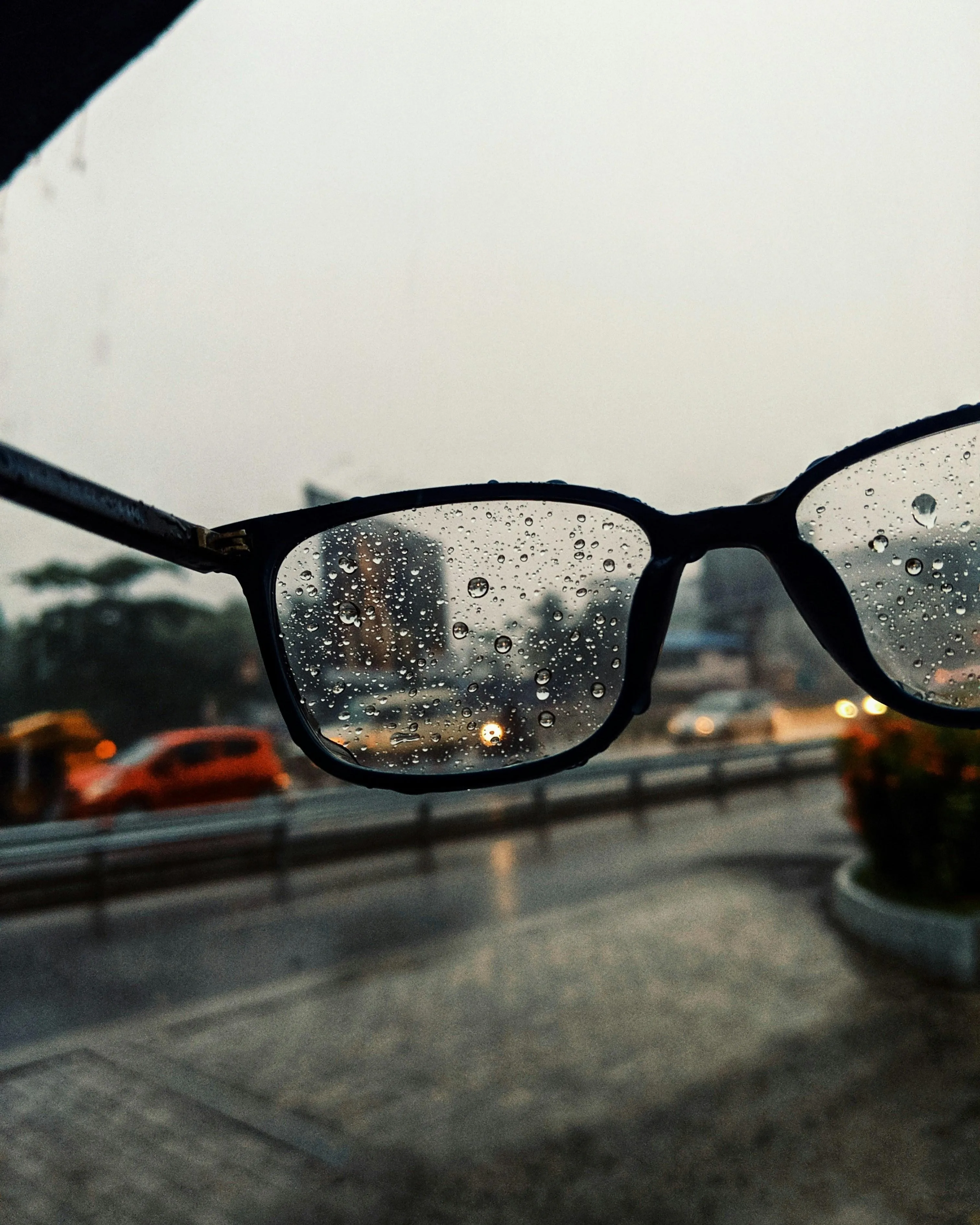Glasses with Raindrops in Soft Natural Lighting Wallpaper