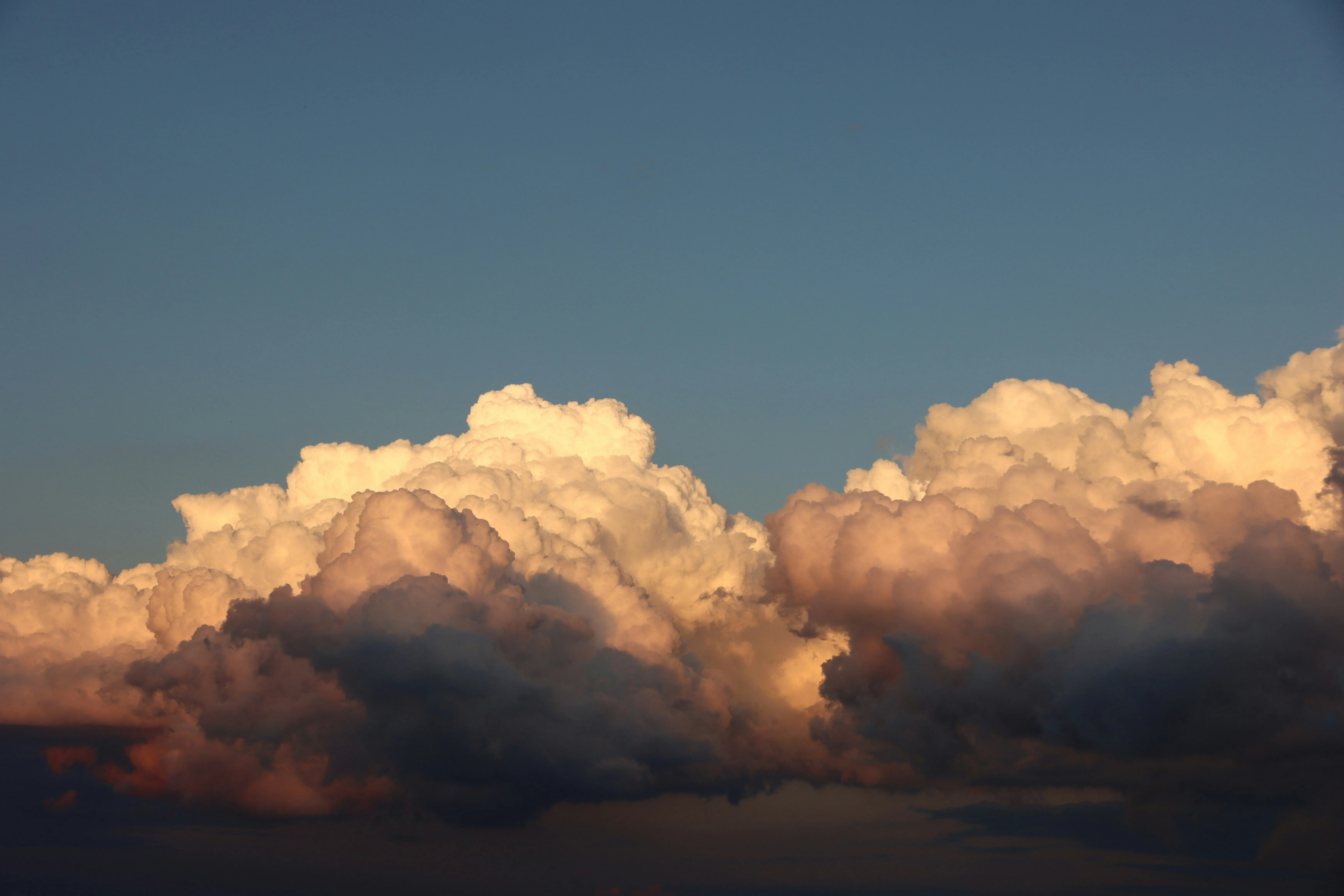 Golden Clouds at Sunset Creating Warm and Beautiful Atmosphere
