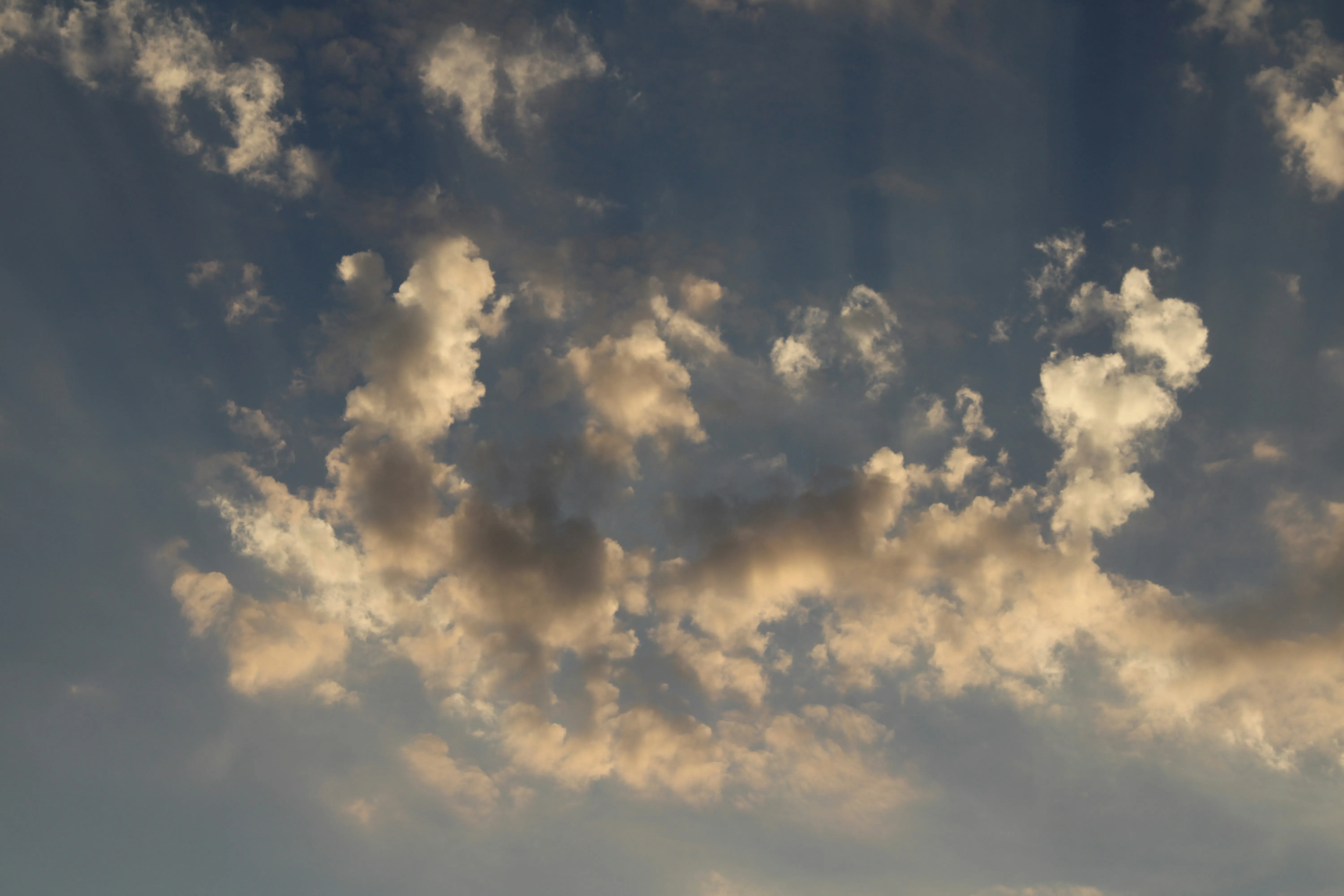 Golden Clouds Glowing in Early Evening Sky Wallpaper 4K