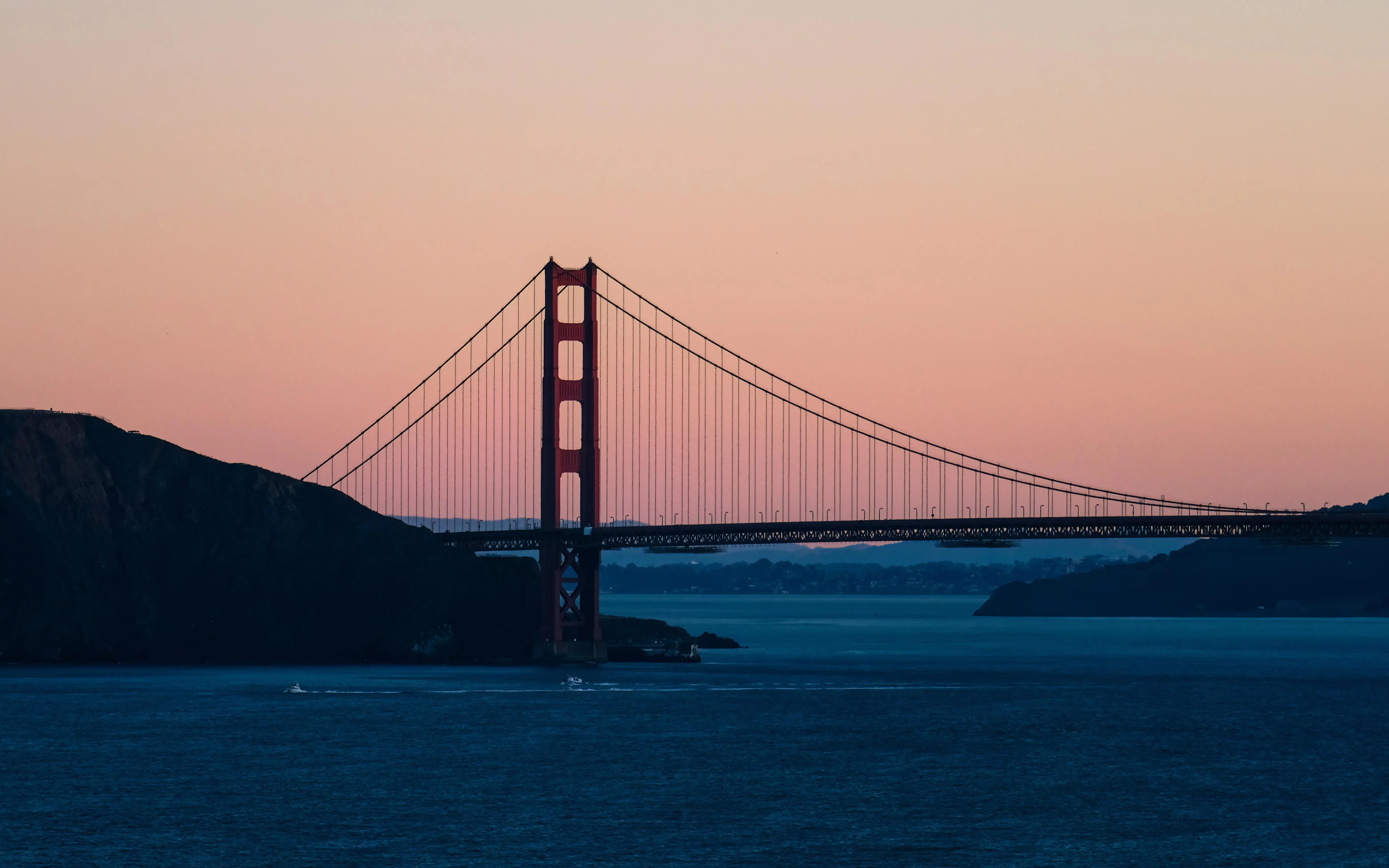 Golden Gate Bridge at dusk with peach sky free HD image