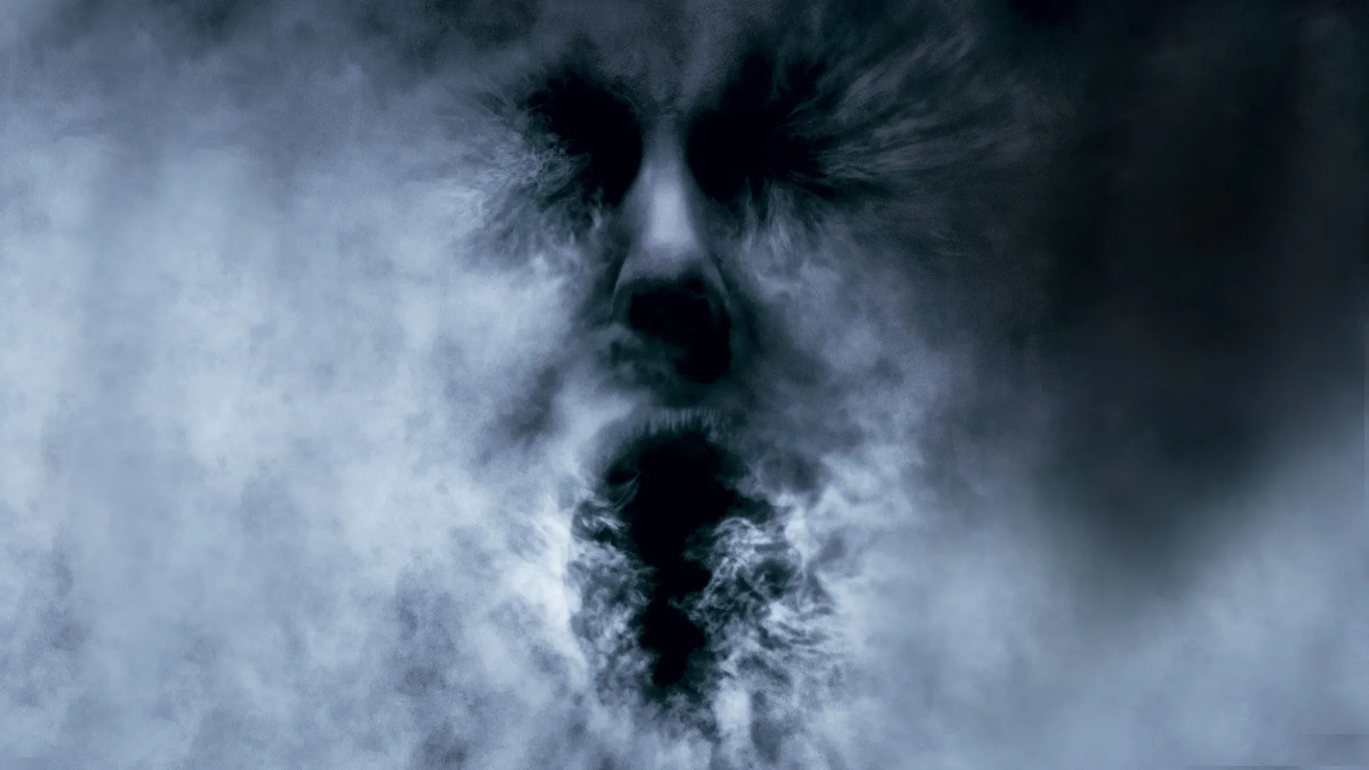Haunting Ghostly Face Emerging From Dense Smoke Mist HD