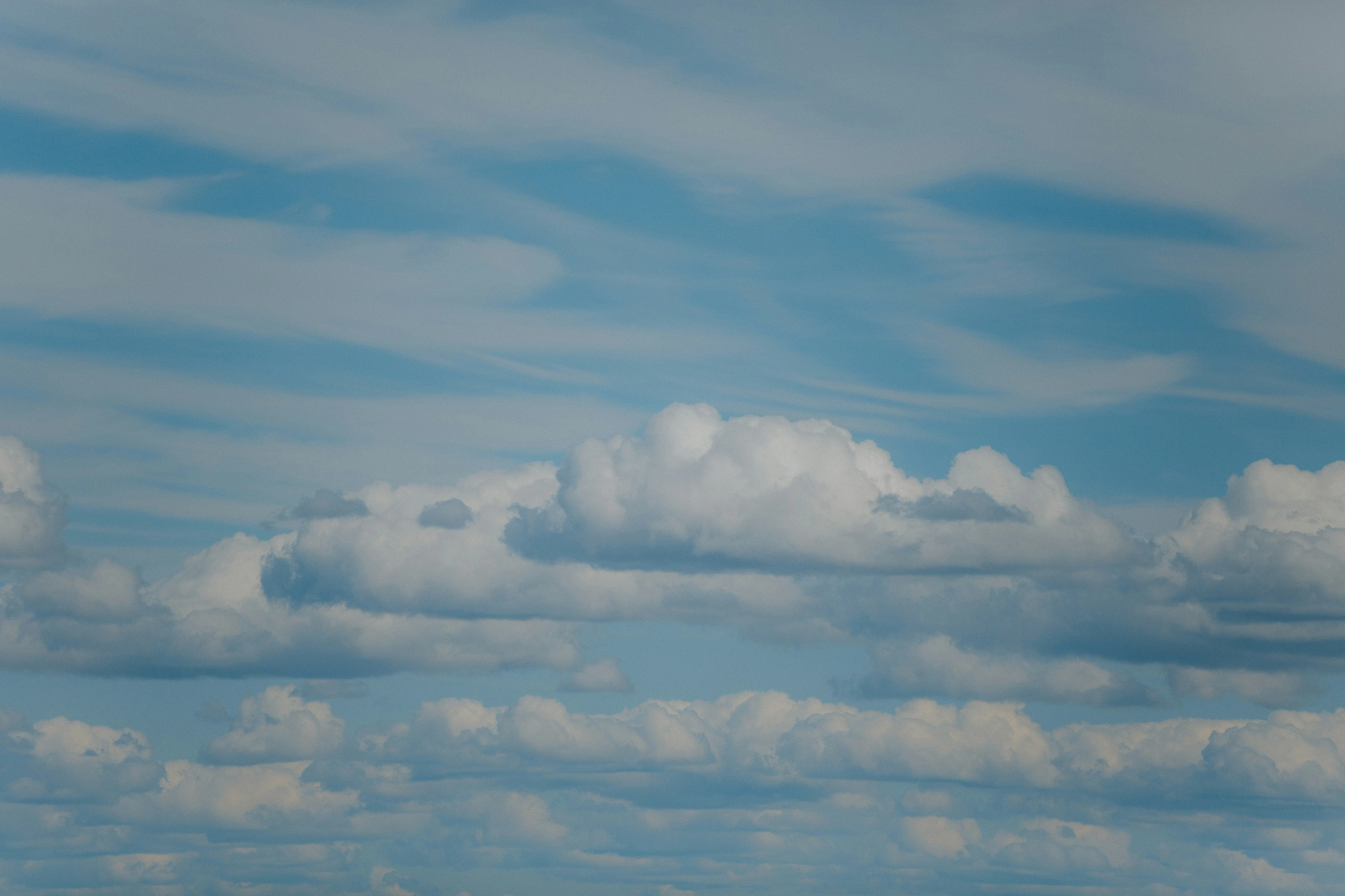 Horizontal Cloud Bands in Open Daytime Sky Wallpaper