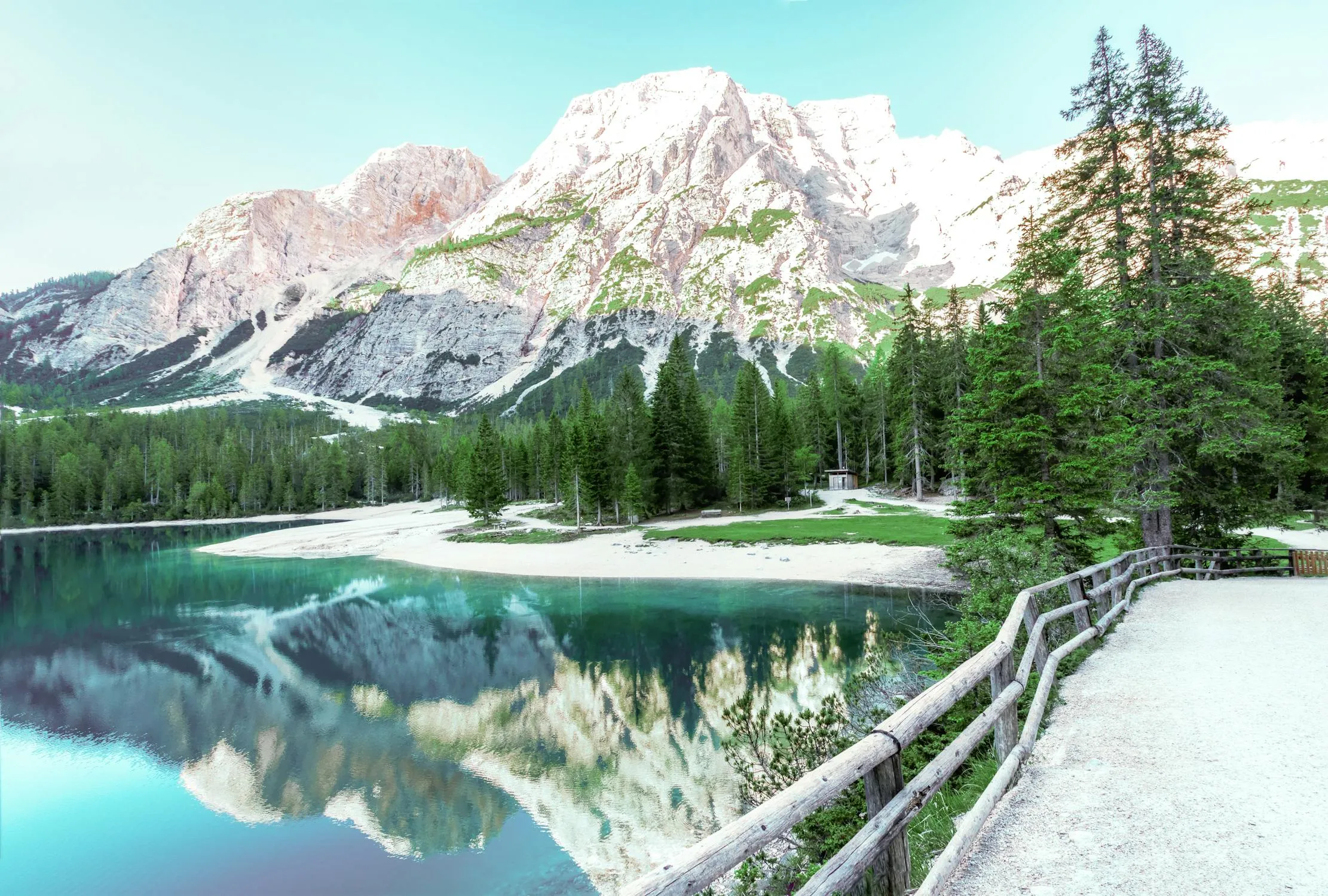 Lake and Snow Capped Mountains in a Forest Scene Wallpaper