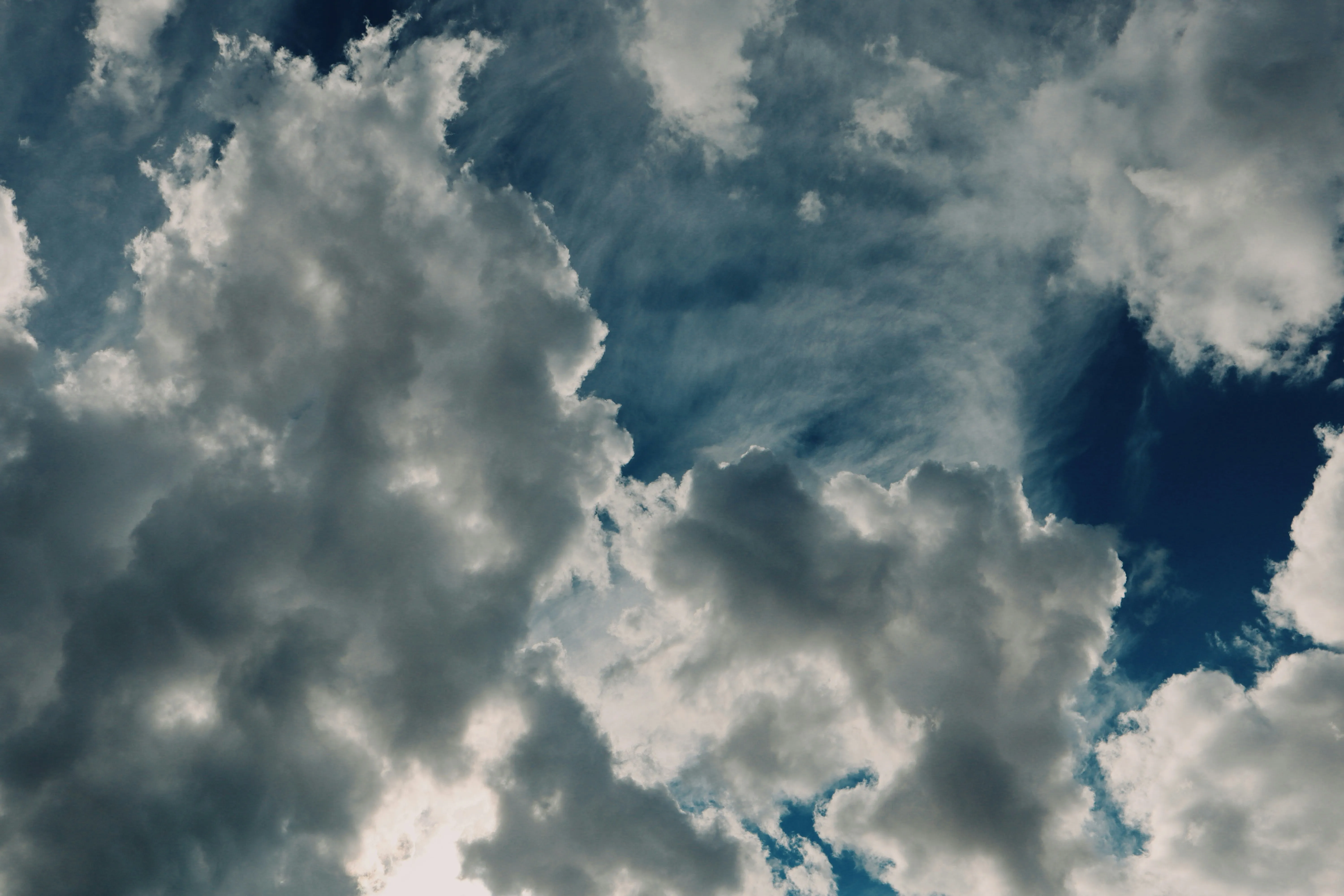 Large Billowing Clouds with Blue Sky Peeking Through