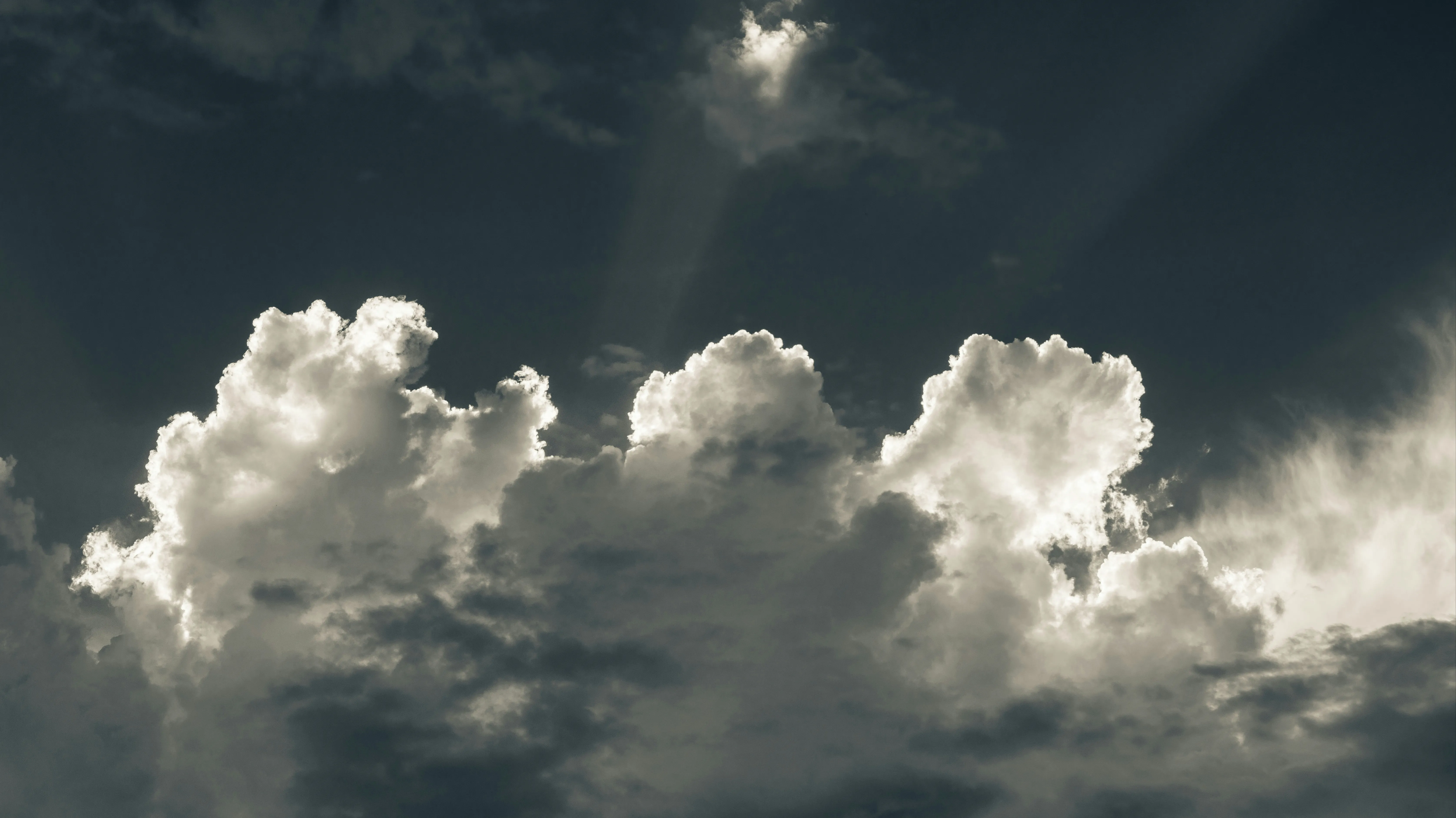 Large White Clouds Against Blue Sky on a Sunny Day Photo
