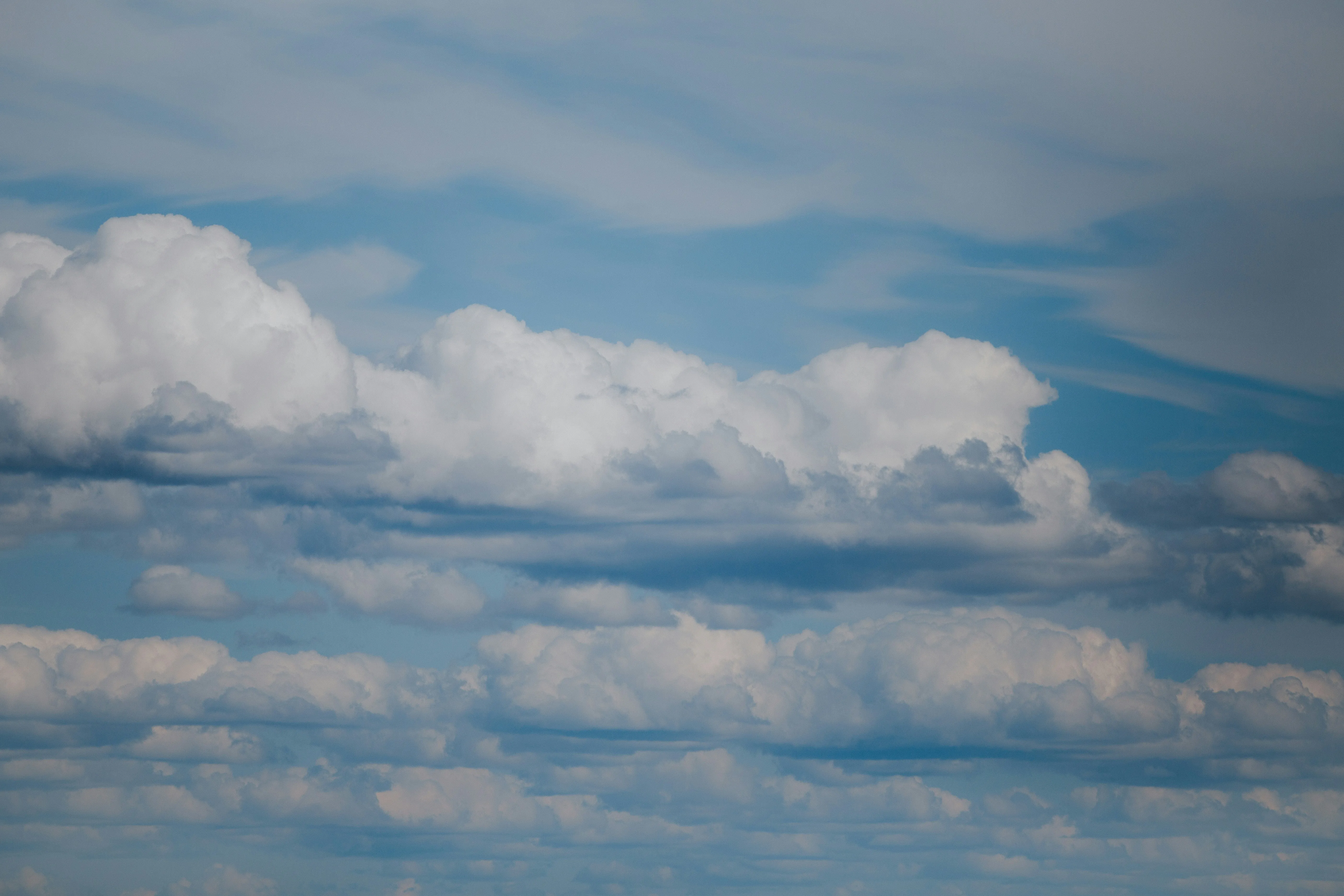 Layered White and Gray Clouds Covering Wide Sky Landscape
