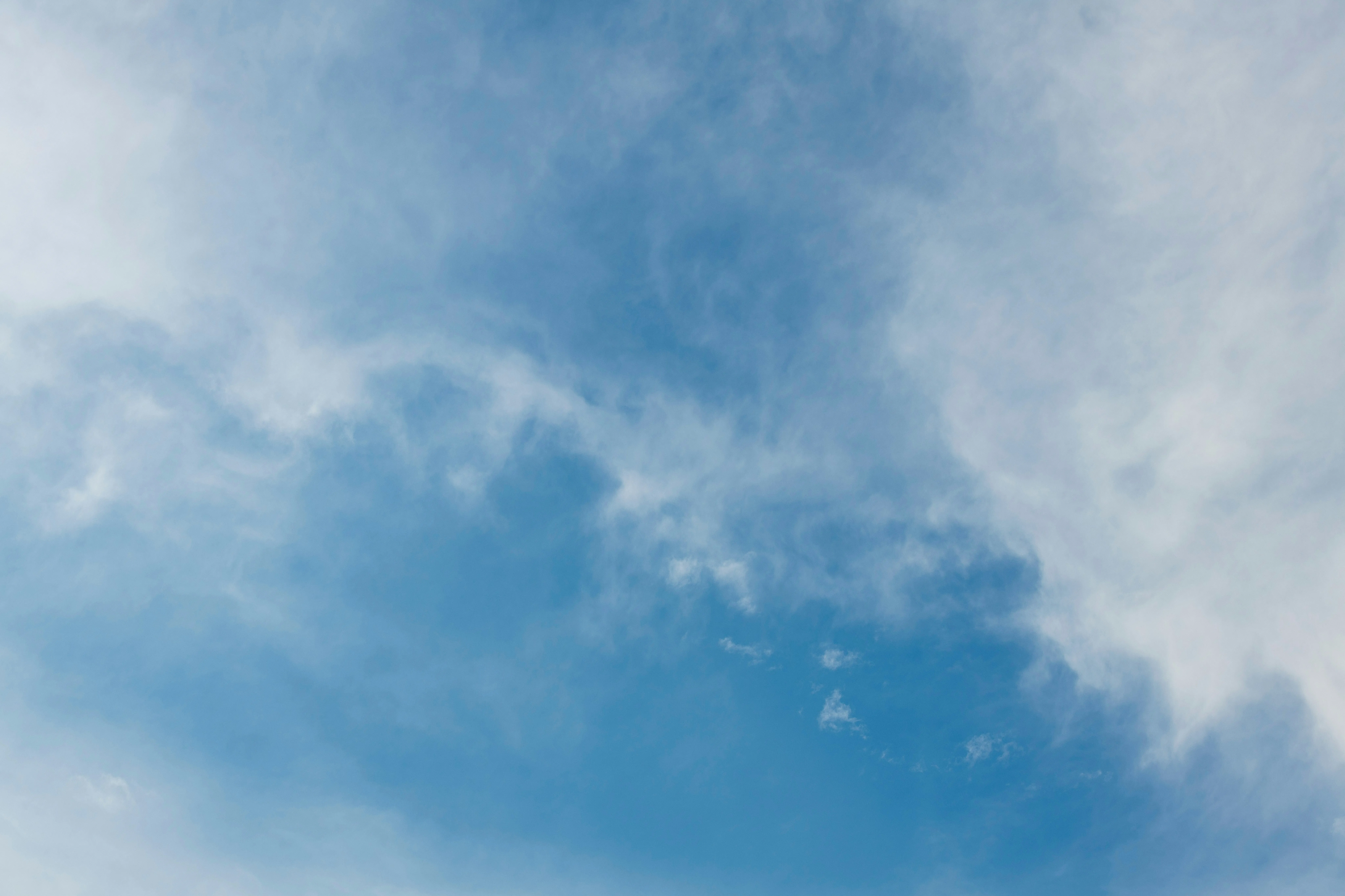 Light Blue Cloudy Sky Forming Subtle Atmospheric Textures