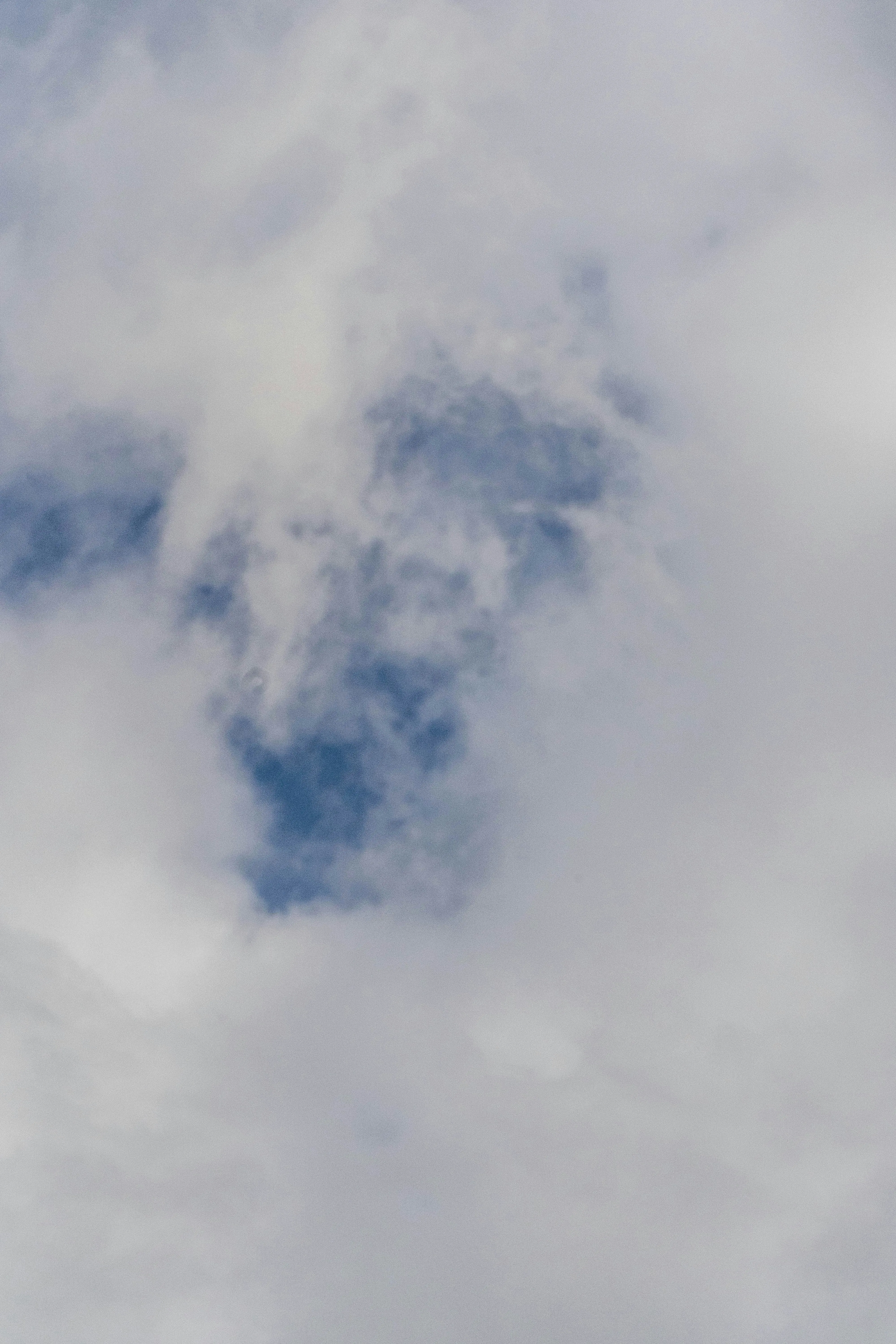 Light Gray Clouds in a Bright Sky Creating Soft Mood