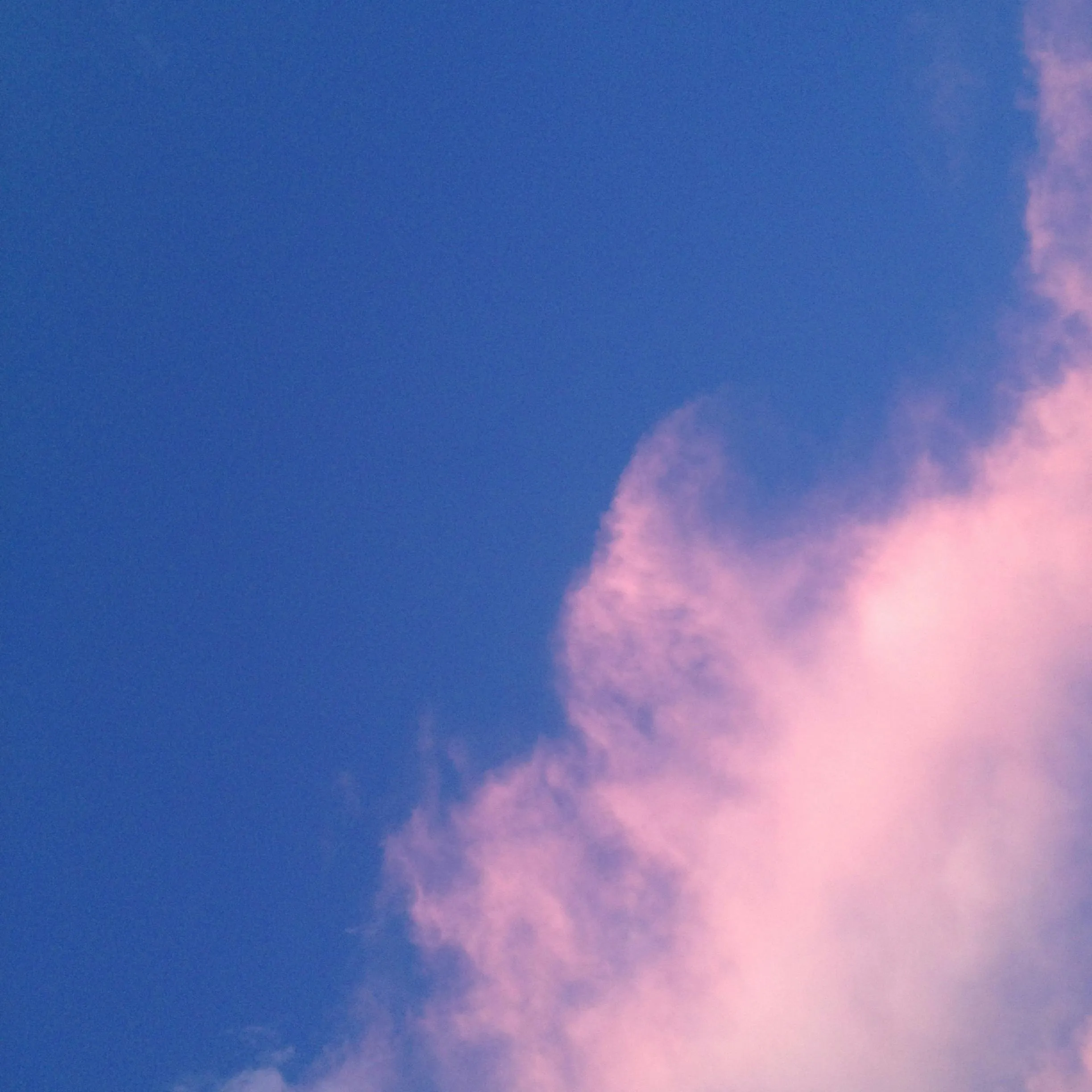 Light Pink Clouds in a Serene Blue Sky Background Free HD