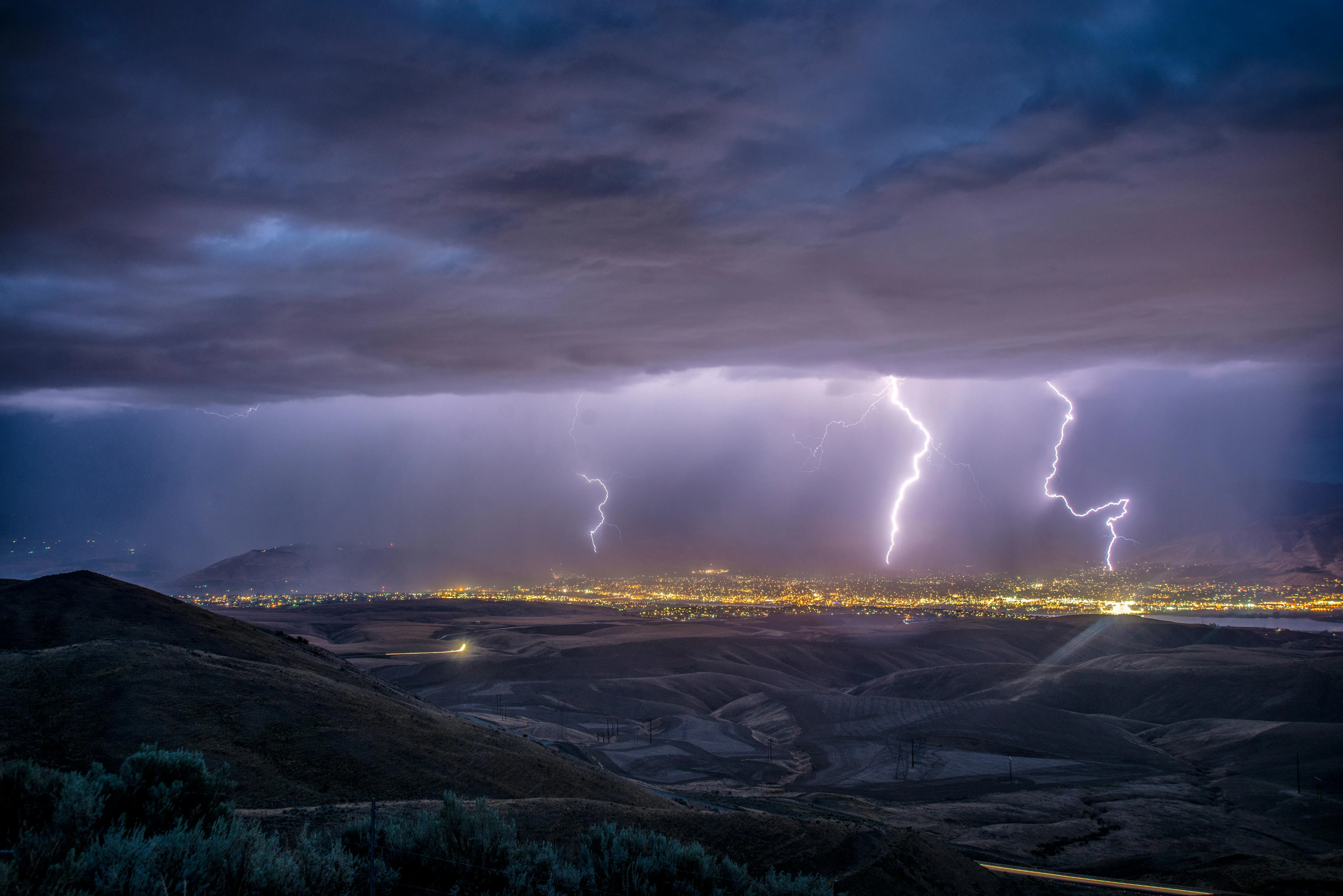 Lightning Storm Striking Ocean with Dark Cloudy Sky