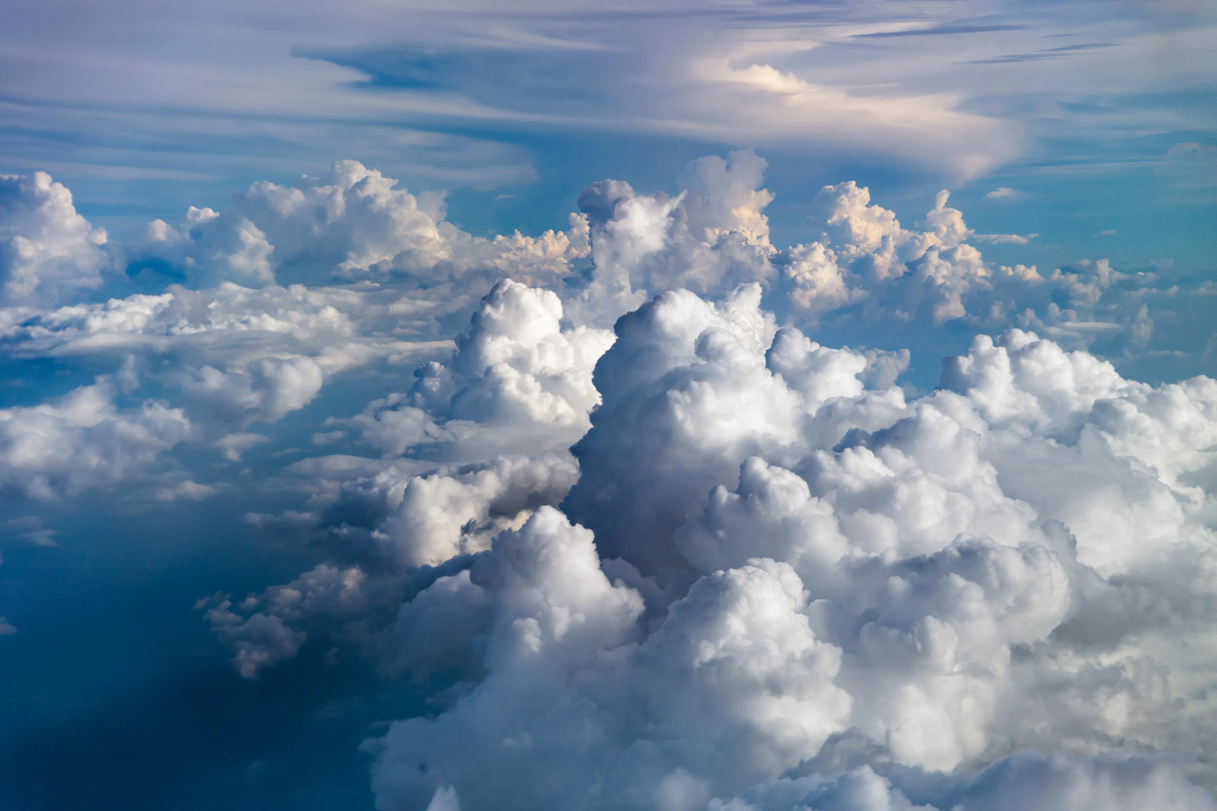 Massive Puffy Clouds Seen From Above During a Flight