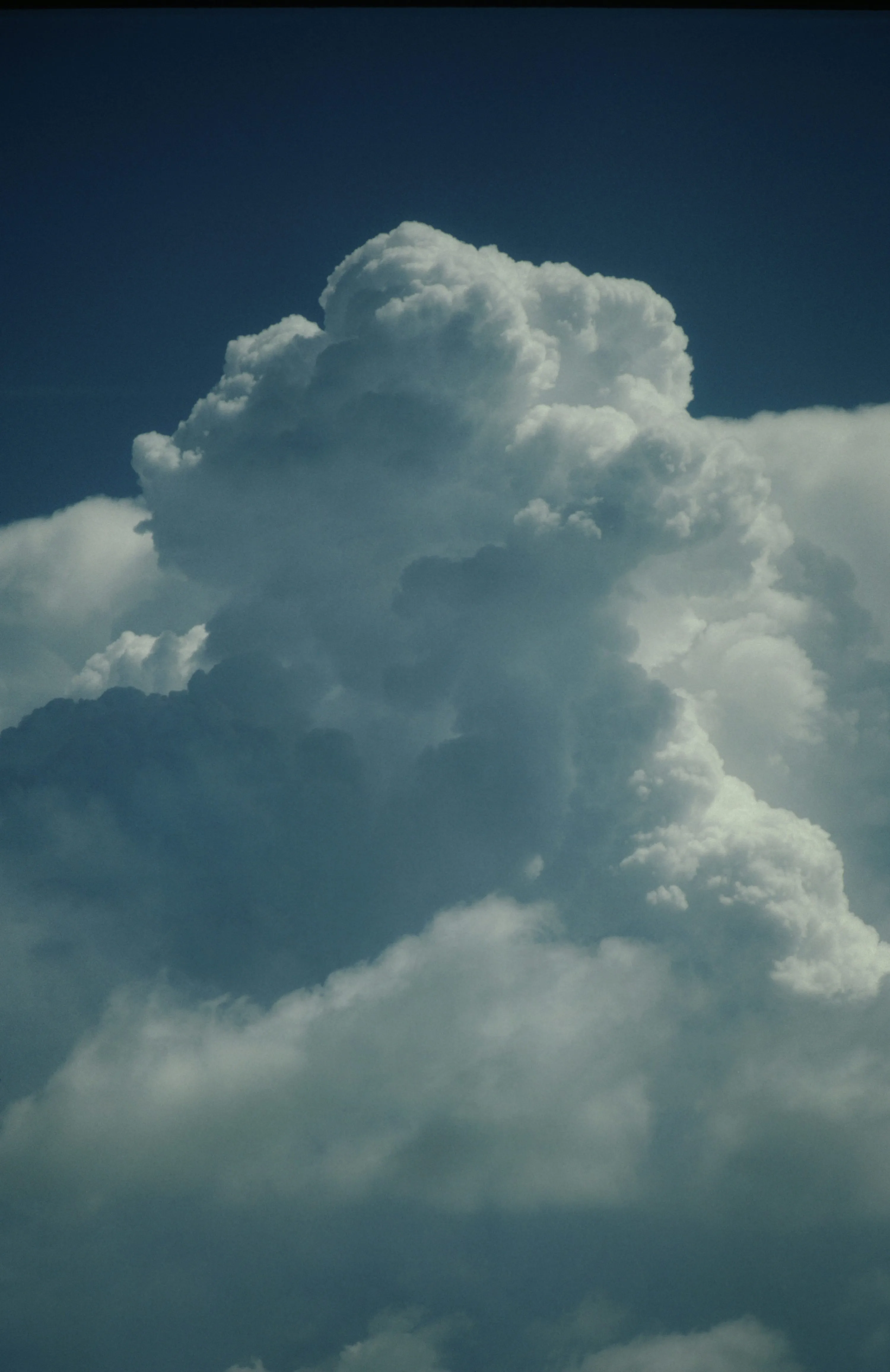 Massive Towering Cloud Reaching Up Into the Sky Wallpaper