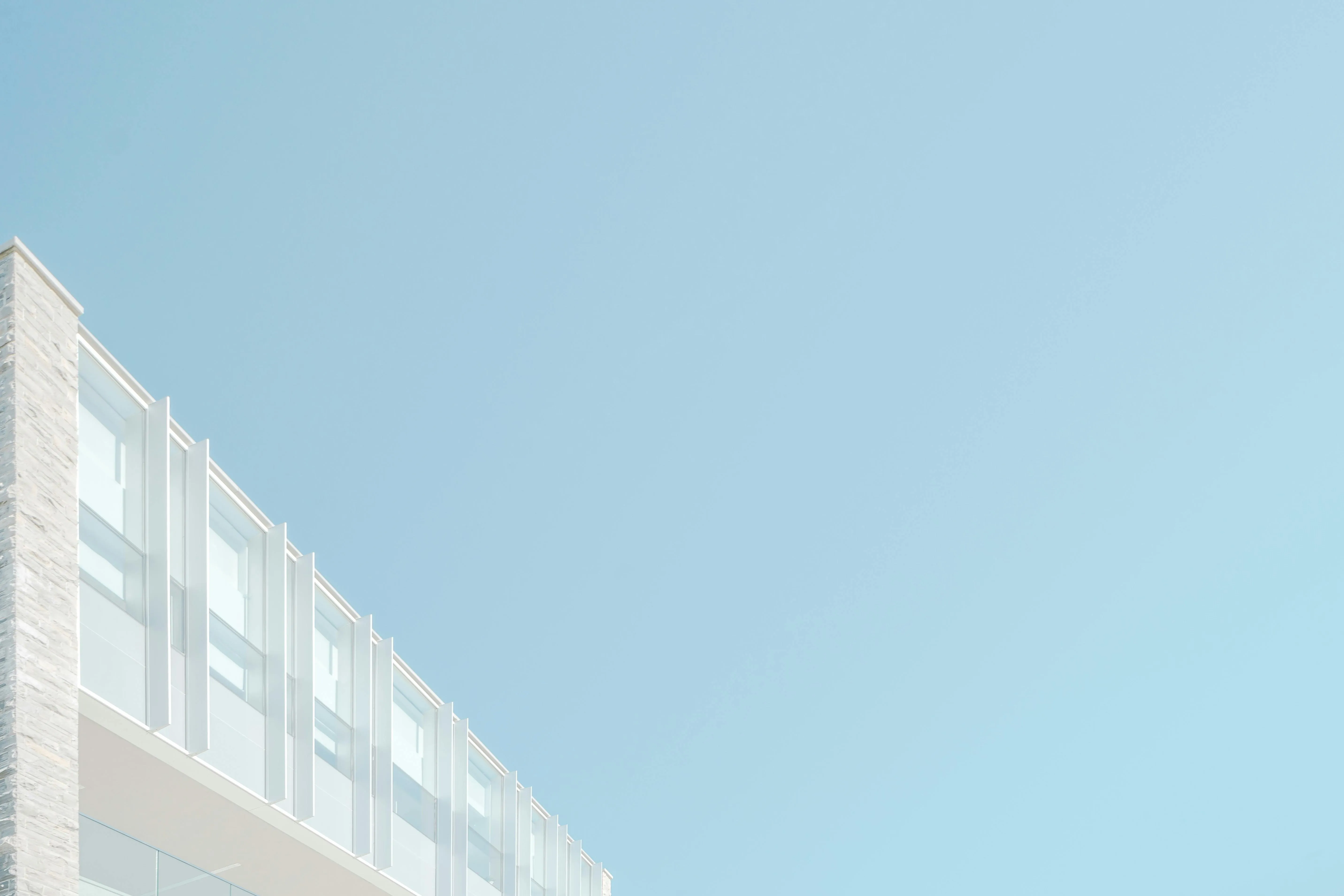 Modern Building Against Clear Blue Sky Background Free 4K