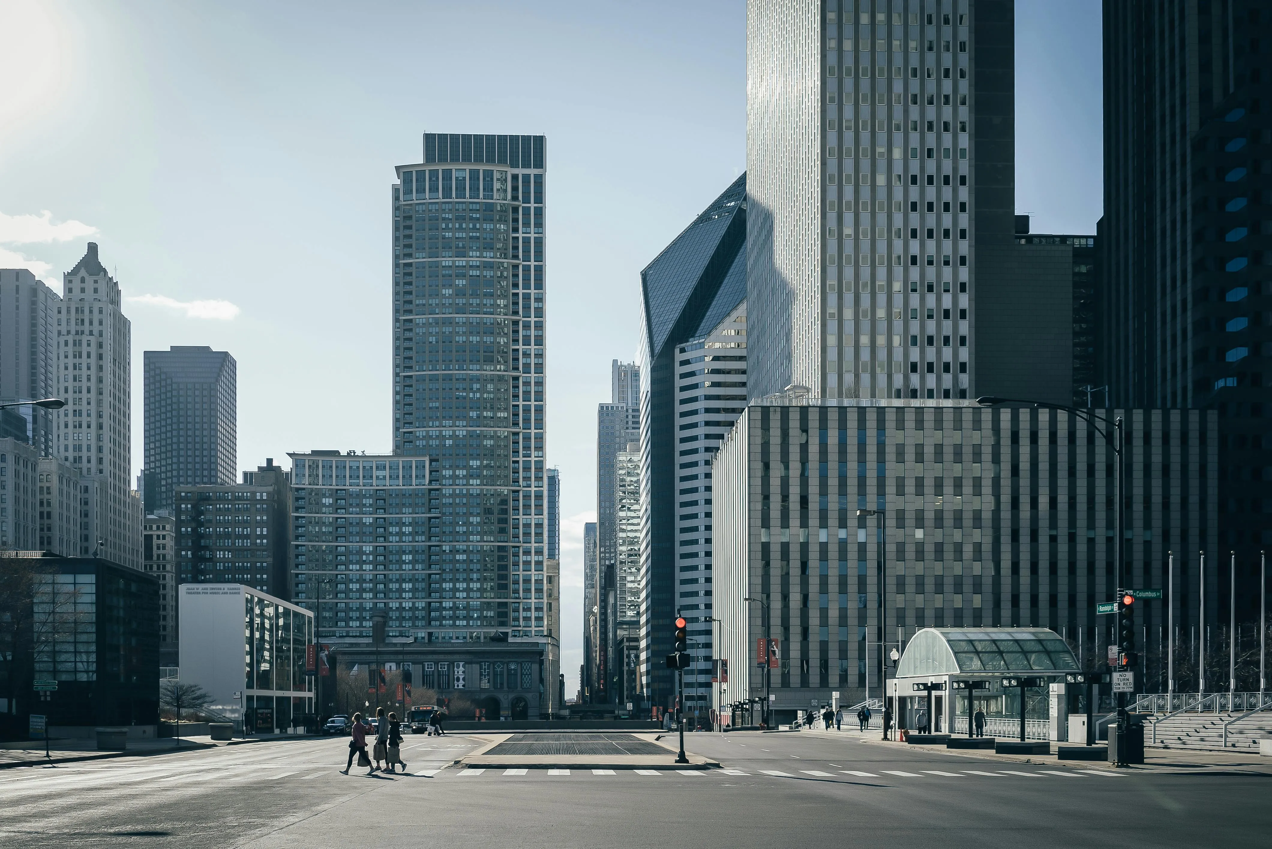 Modern City Skyline Under Clear Blue Sky and Tall Buildings