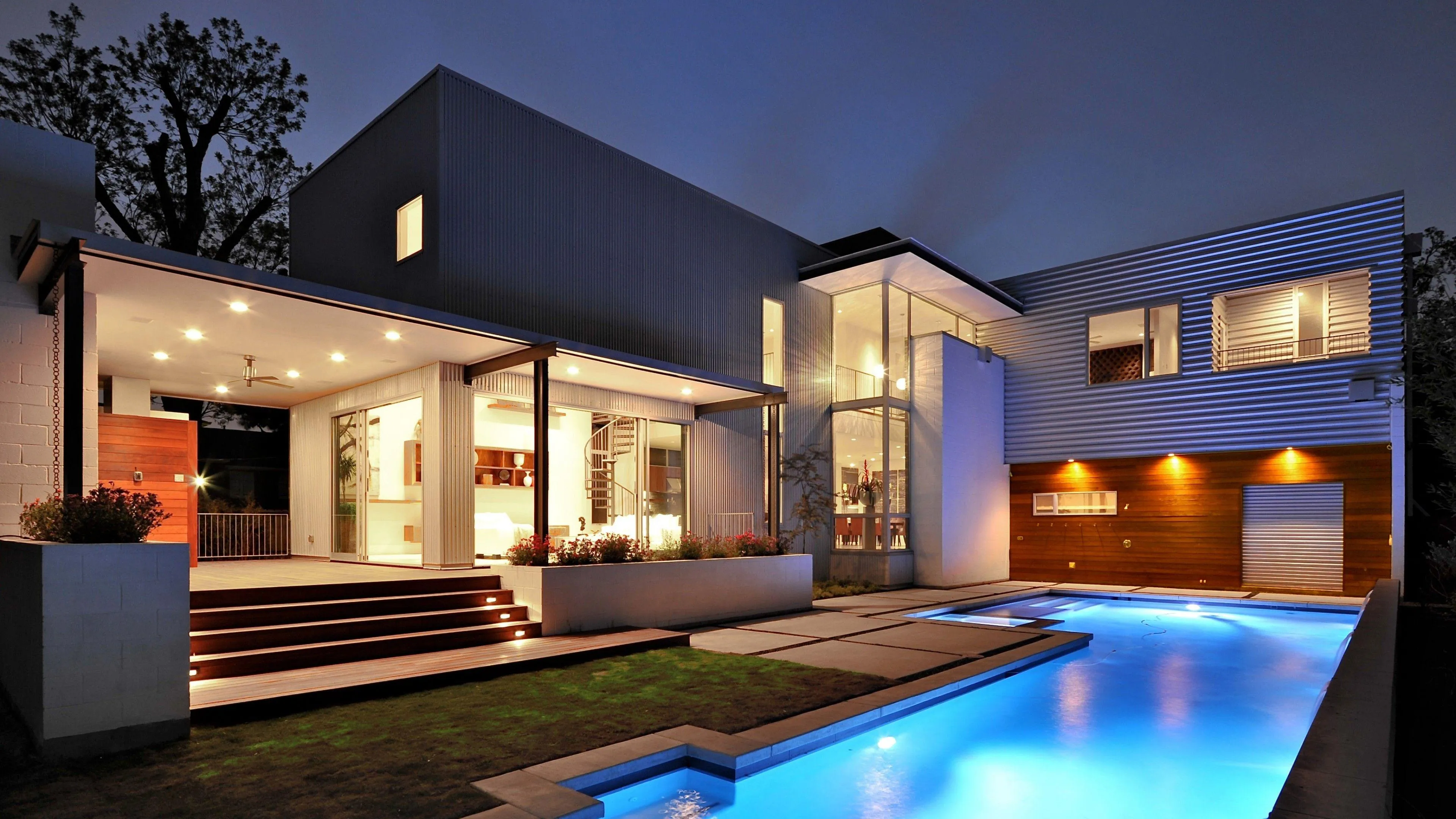 Modern villa house with swimming pool during twilight