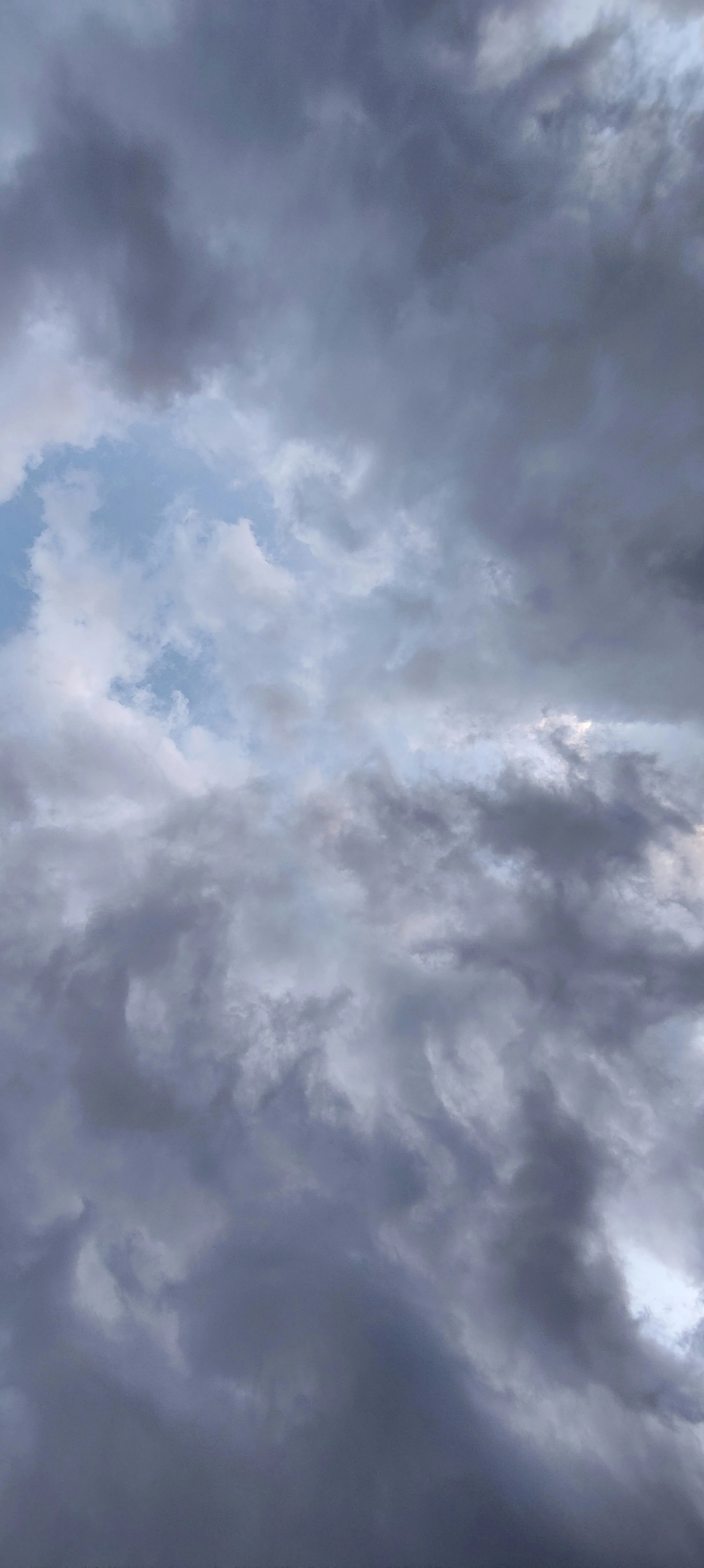 Moody Sky Filled with Thick Gray and Blue Storm Clouds