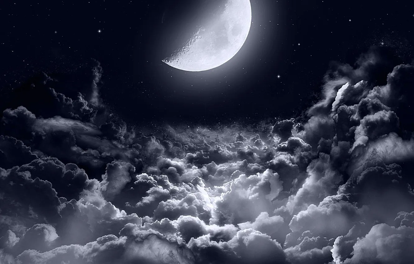 Moon Shining Brightly Over a Dark Cloud Filled Sky Wallpaper