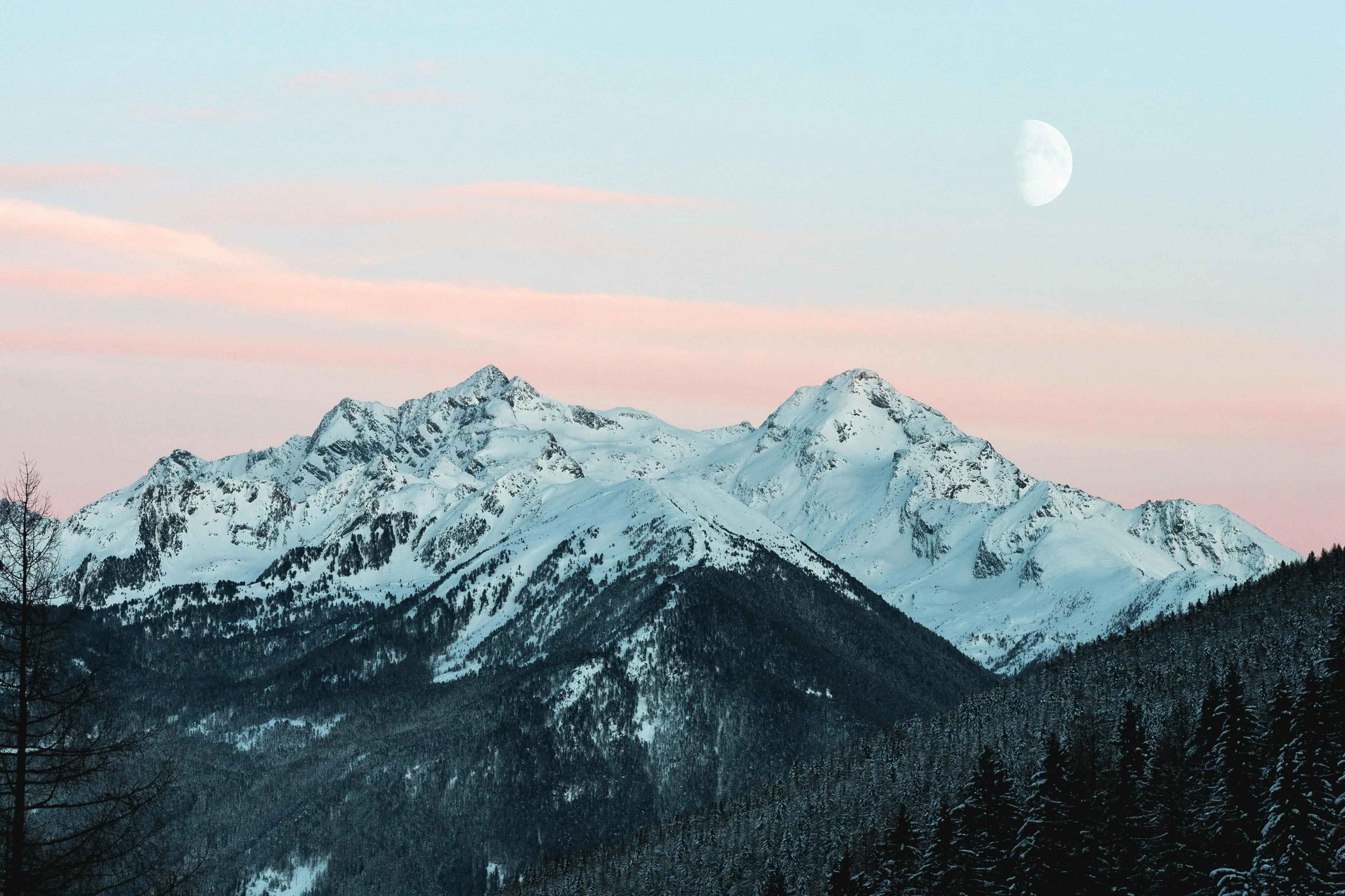 Mountain Range Covered with Snow Under Clear Blue Sky