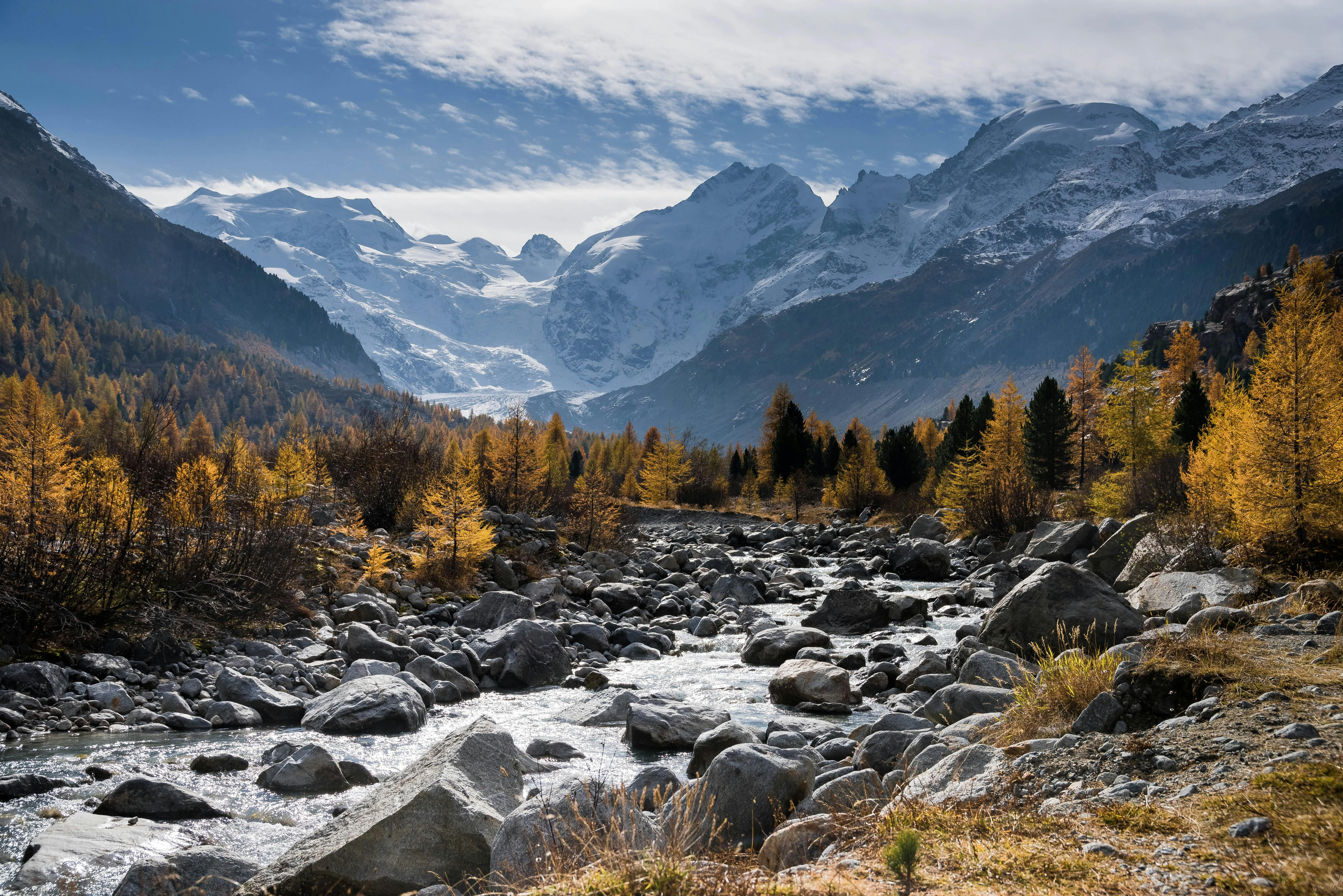 Mountain Stream Rushing Through Autumn Colored Forest Rocks