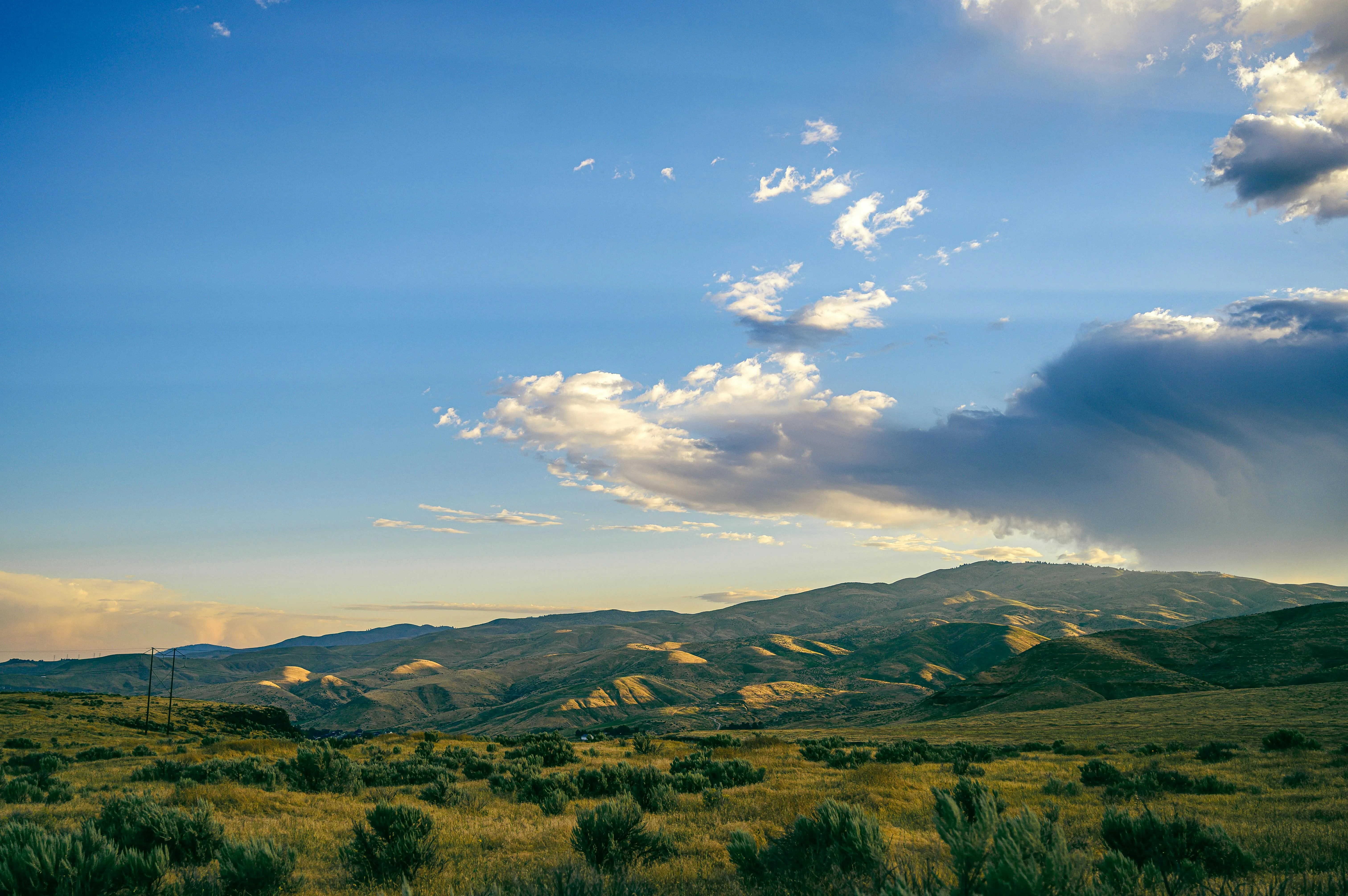 Mountain Under Blue Sky with White Clouds and Sunshine