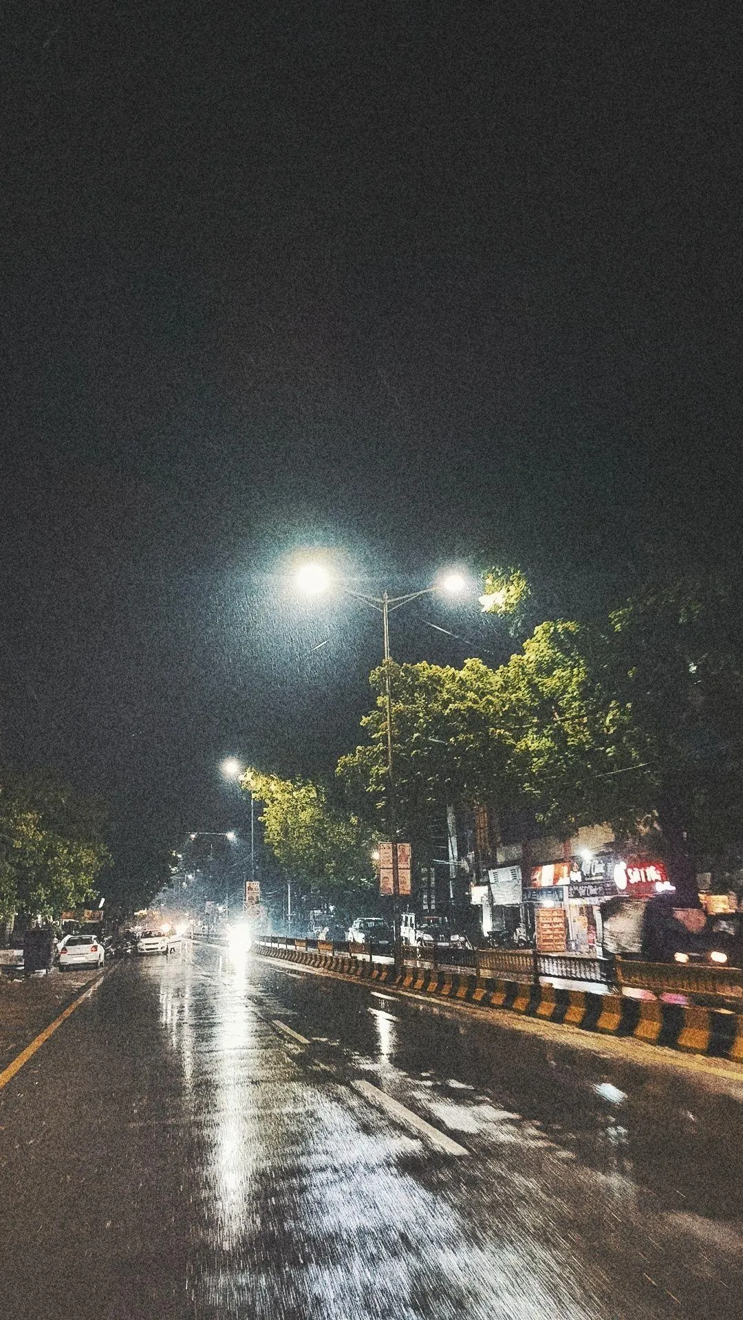 Night Street Scene with Wet Road and Lights Free Wallpaper