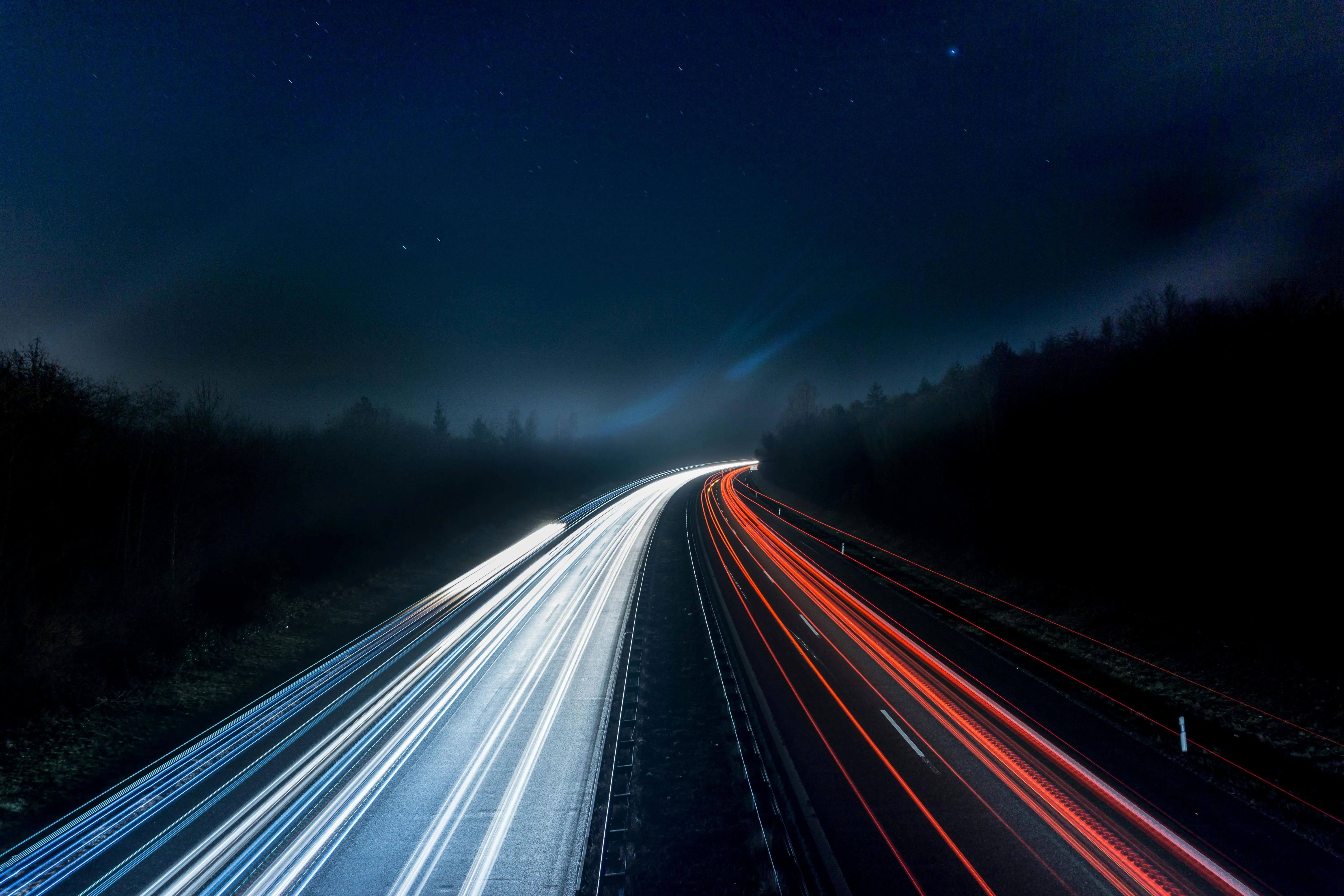 Nighttime Highway with Long Exposure Light Trails Image