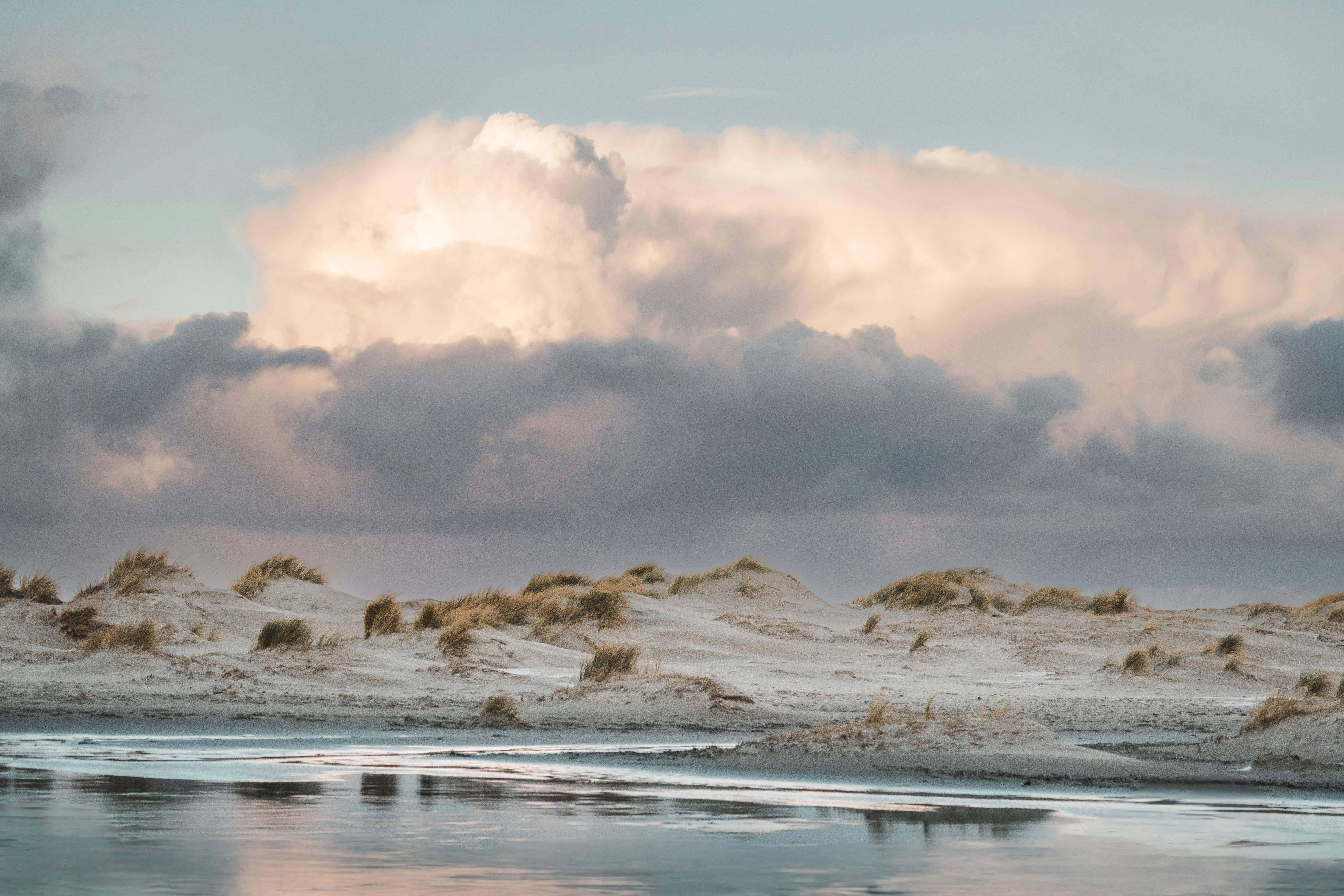 Ocean Beach with Dramatic Low Altitude Cloudscape Image