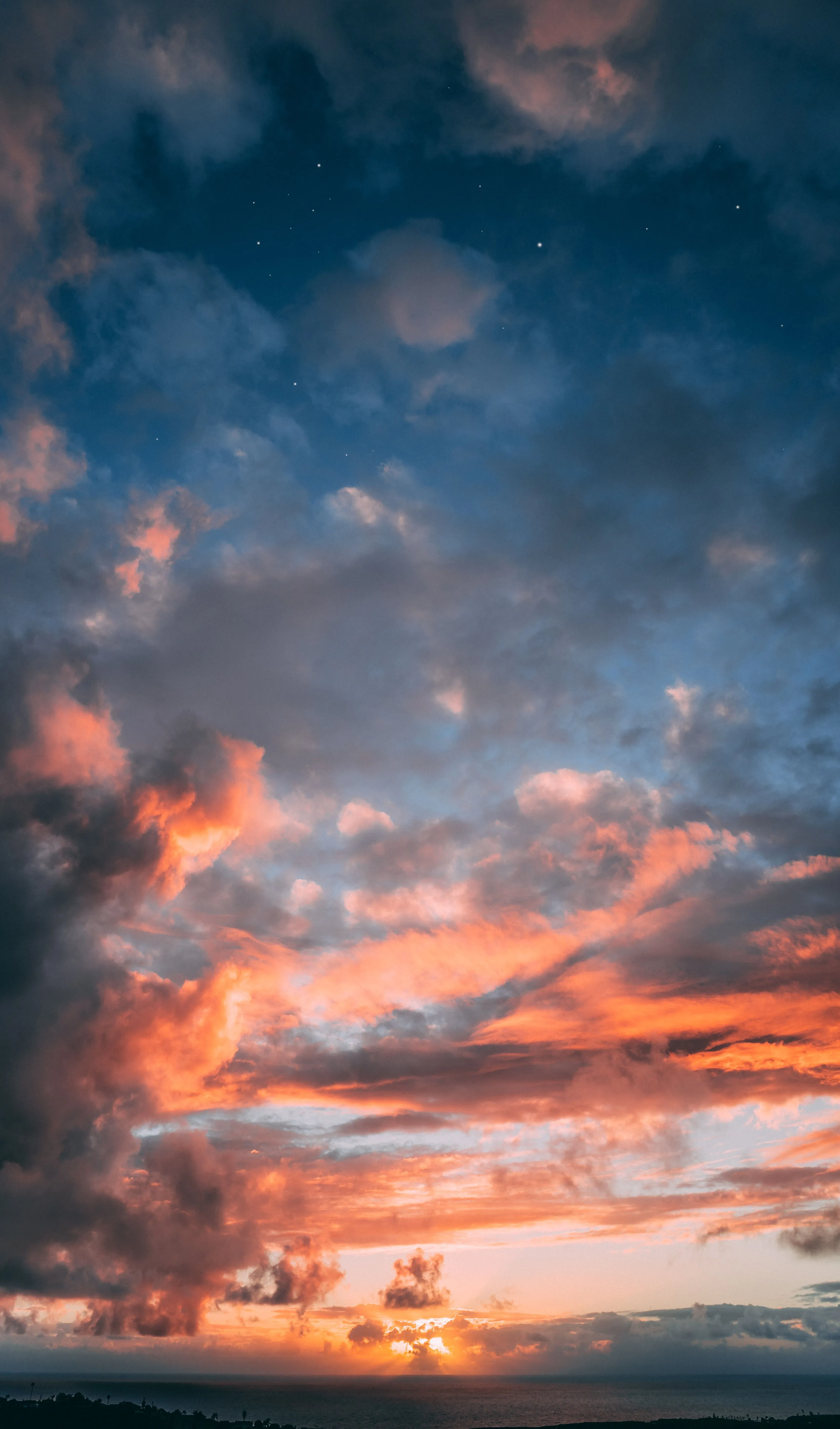Orange and Pink Sunset Clouds Lighting Up Evening Sky