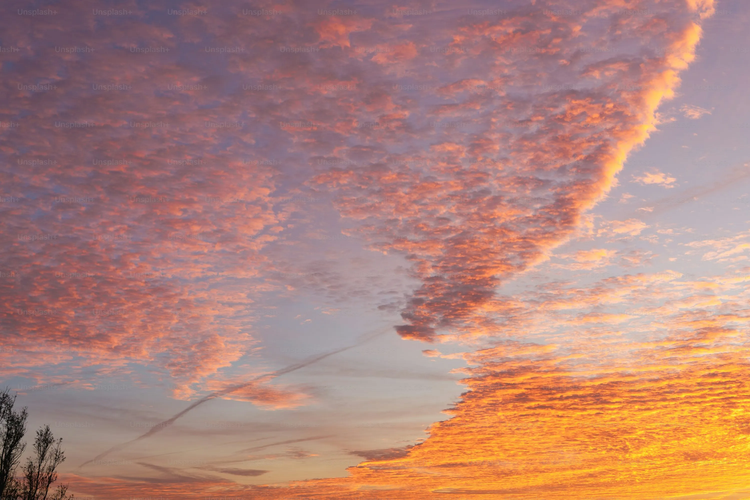 Orange Cloud Streaks During a Peaceful Sunset Moment