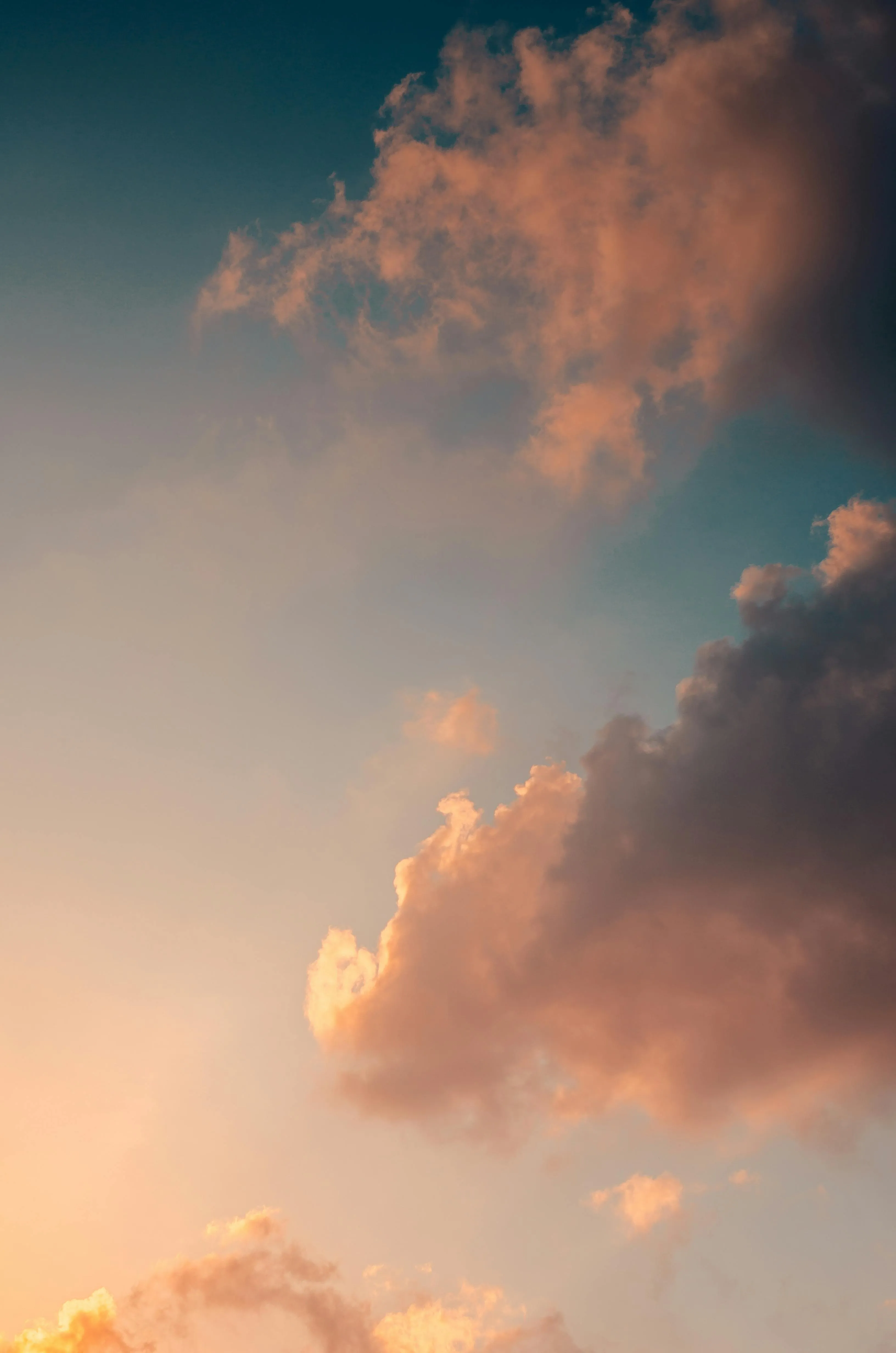 Orange Clouds Rise Through Peaceful Dusk Sky HD Image