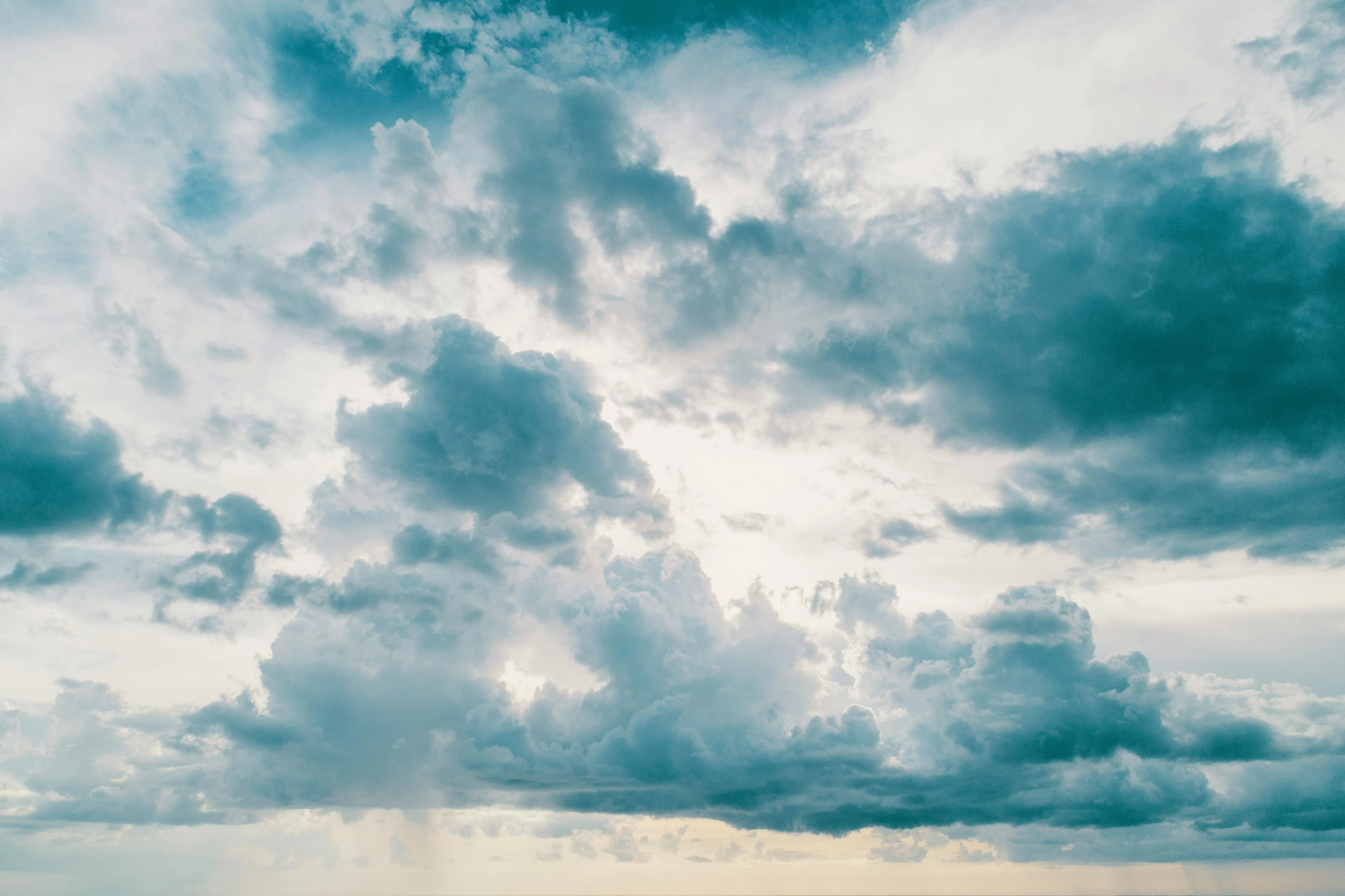 Overcast Sky Above a Calm Seashore with Clouds Image