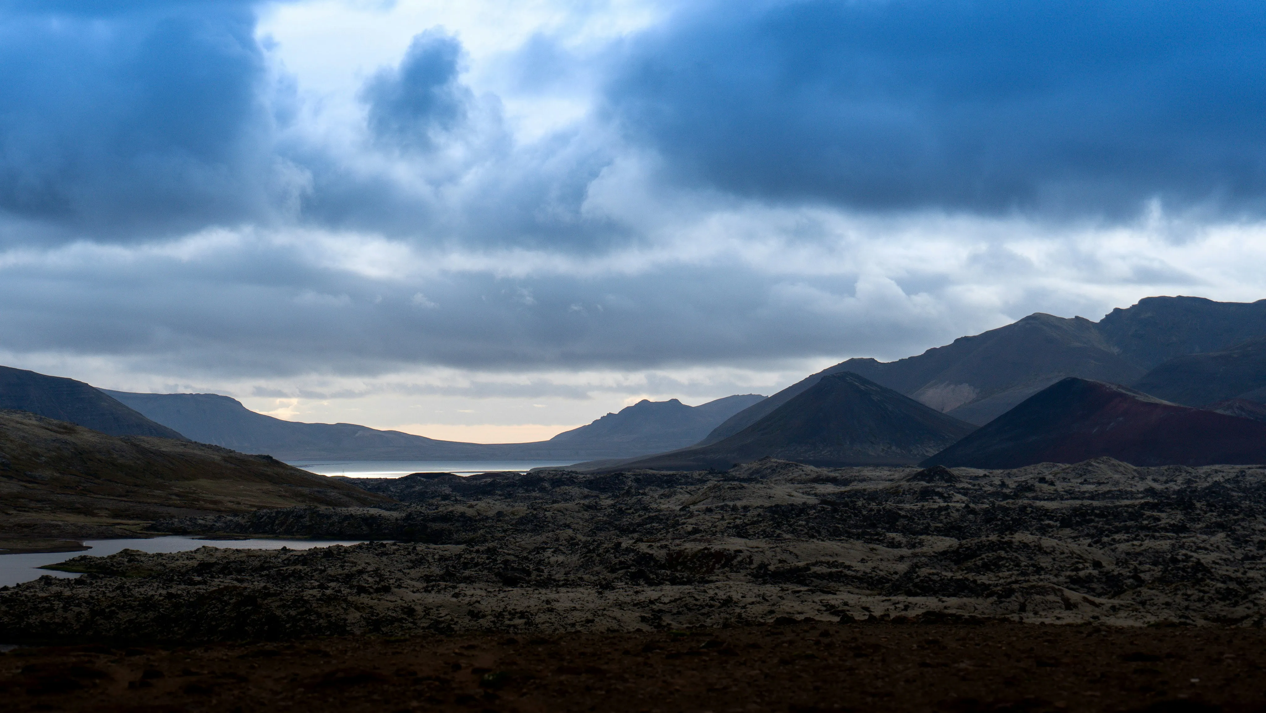 Overcast Sky Above Mountain Valley and Distant Ridges