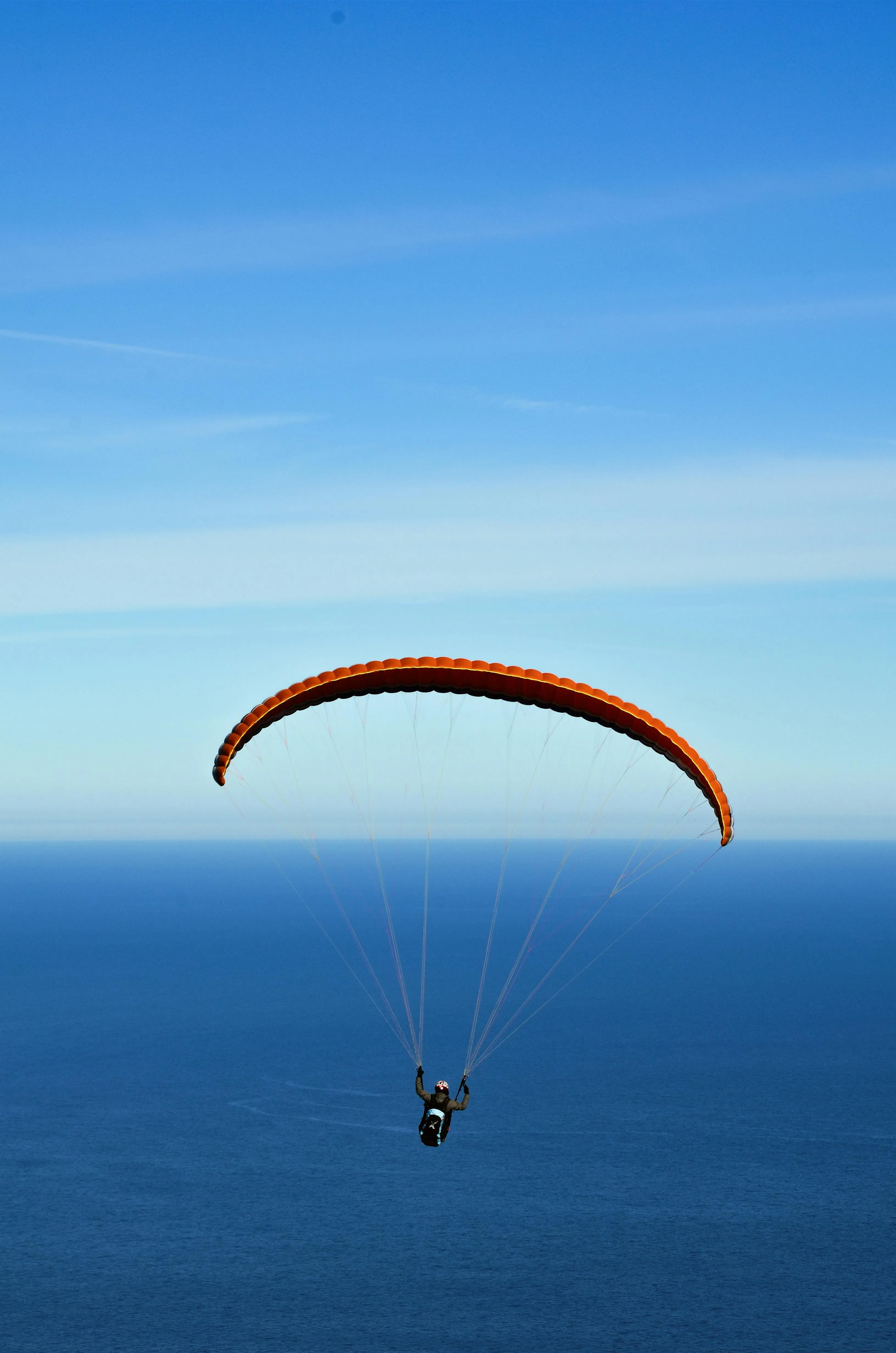 Paraglider Soaring Under Clear Blue Sky Free HD Image